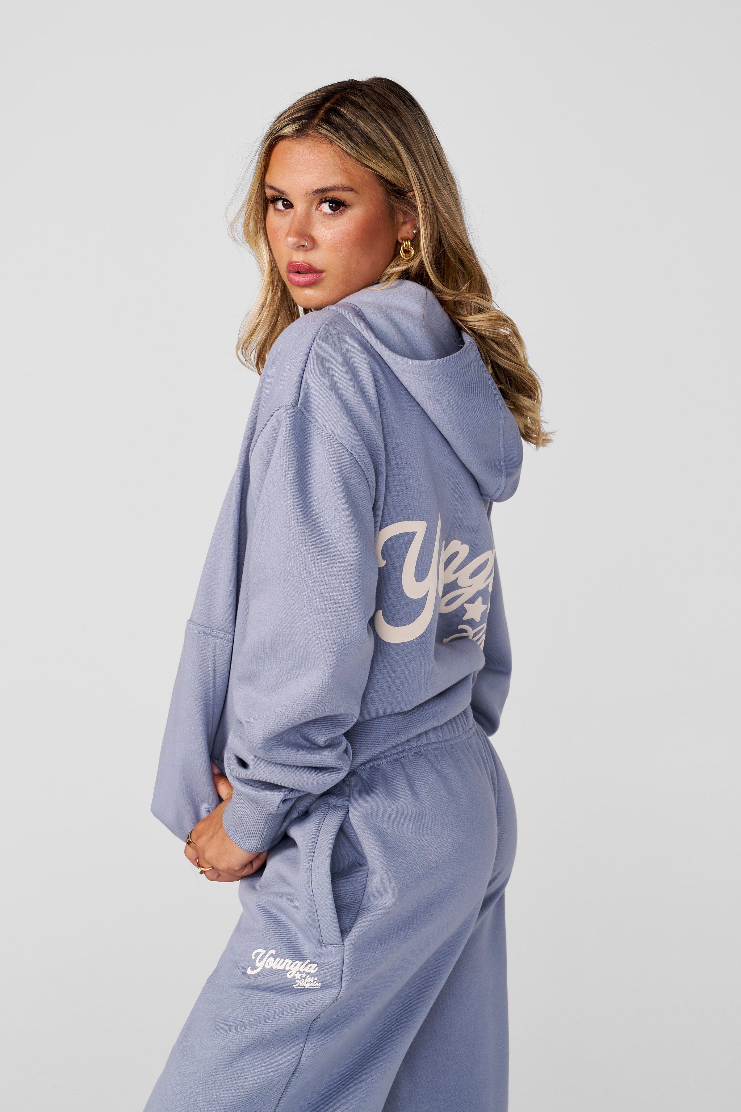 Close-up of the puff print detail on the oversized hoodie.
