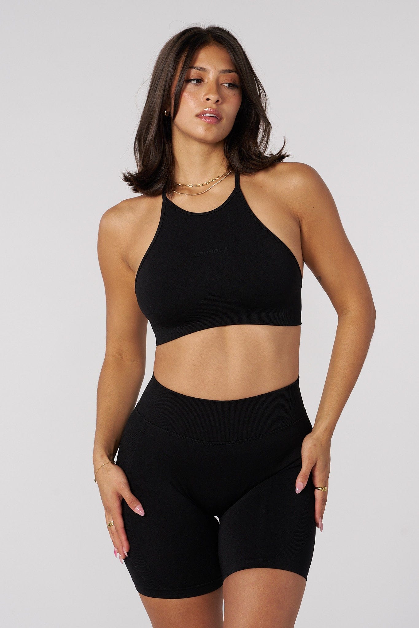 Model wearing the cross-back design for activewear and casual outings