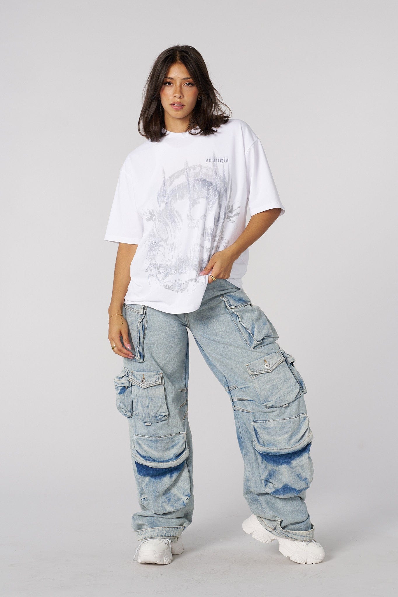 Front view of the skull graphic oversized tee on a model