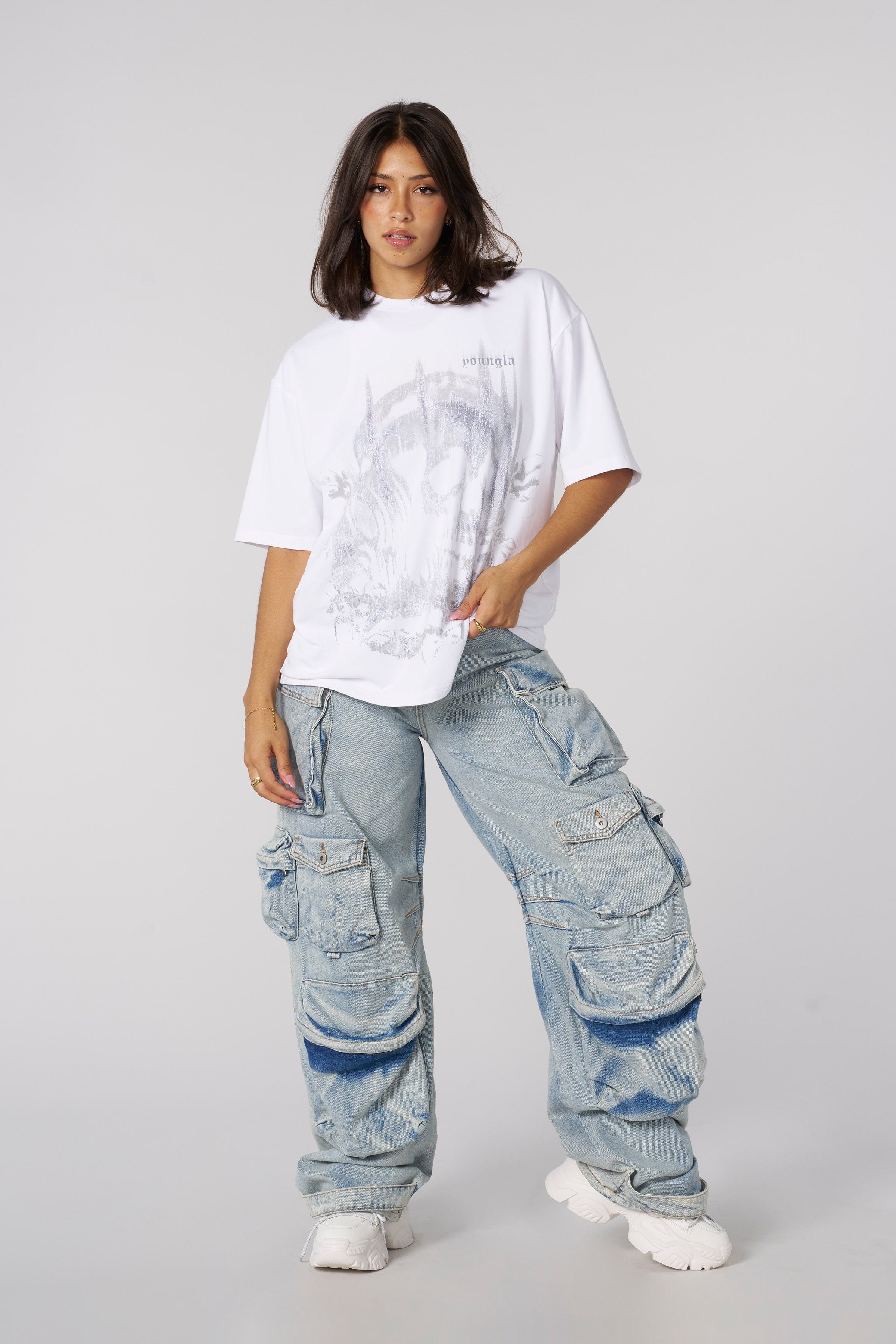 Casual outfit featuring baggy black jeans, styled for a relaxed look.