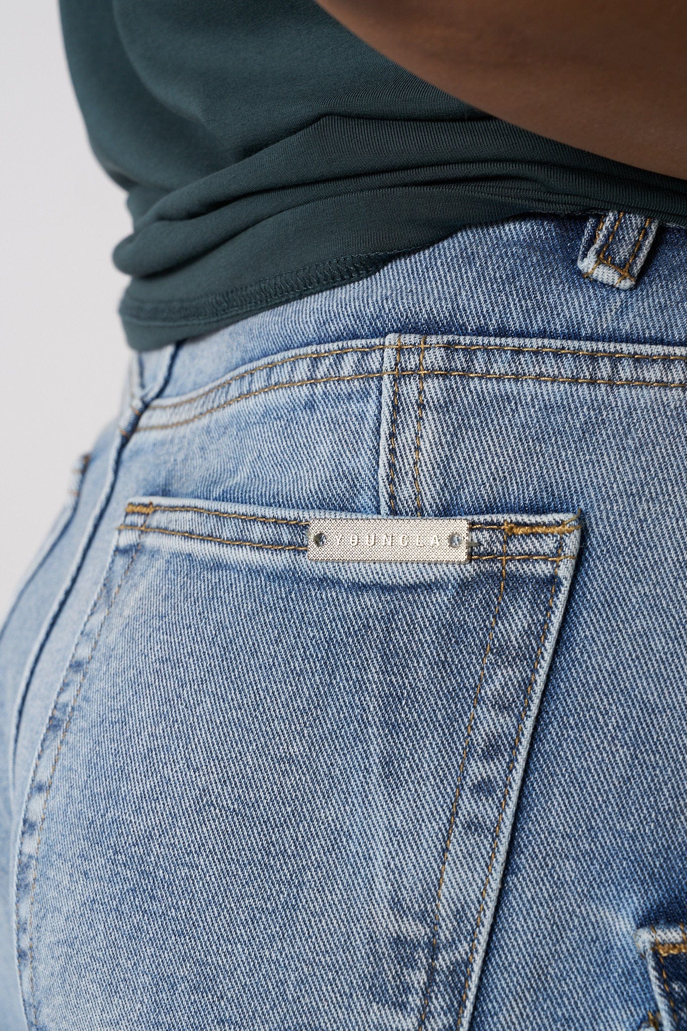 Side view of cargo trouser jeans, highlighting multiple pockets.