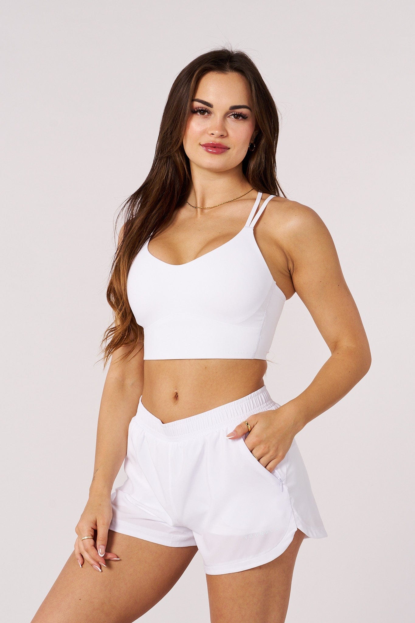 Back view of sports bra showing secure closure during yoga pose