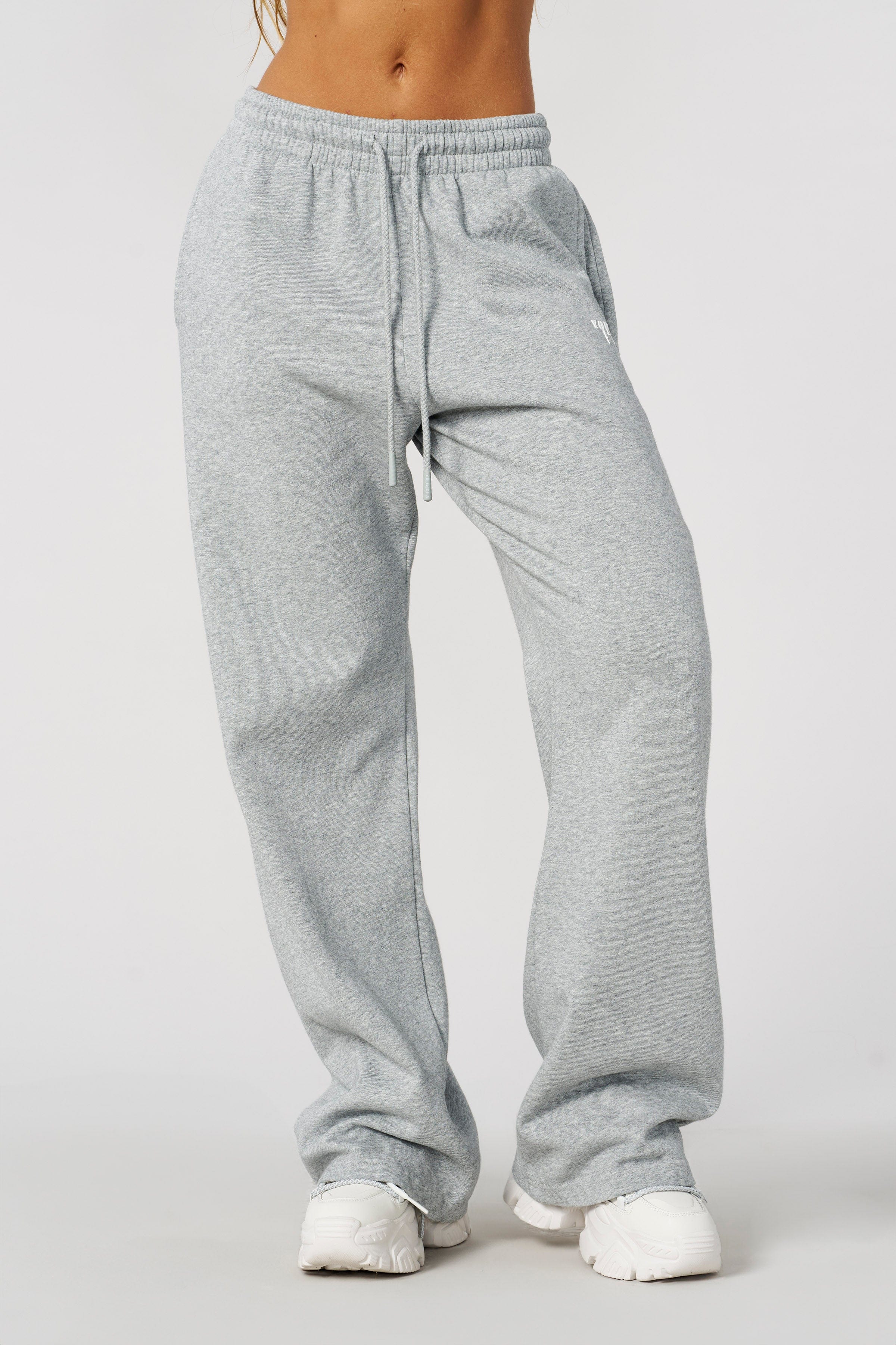 Front view of black slim fit joggers for men, perfect for summer wear.