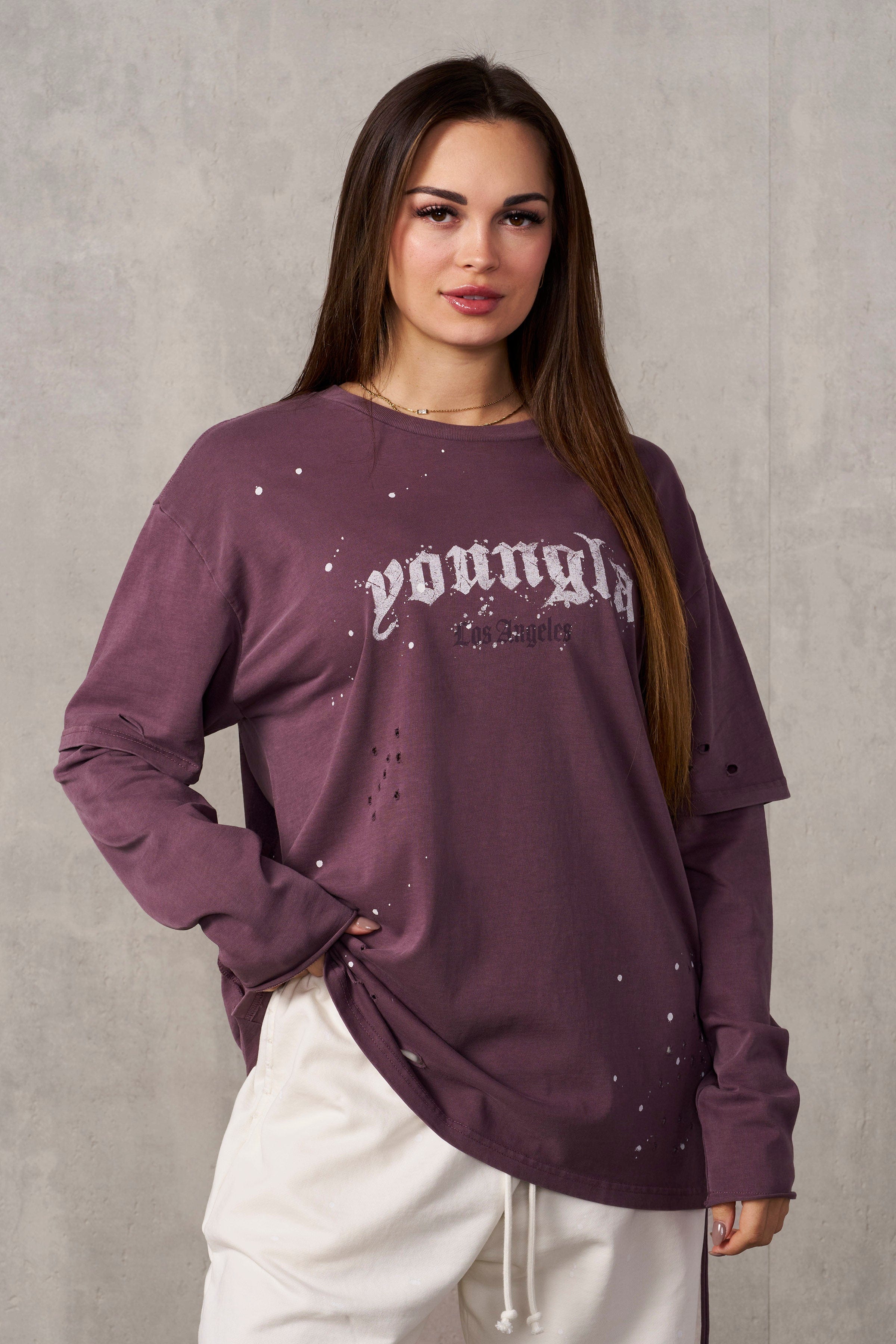 Front view of distressed oversized t-shirt for men in urban style.