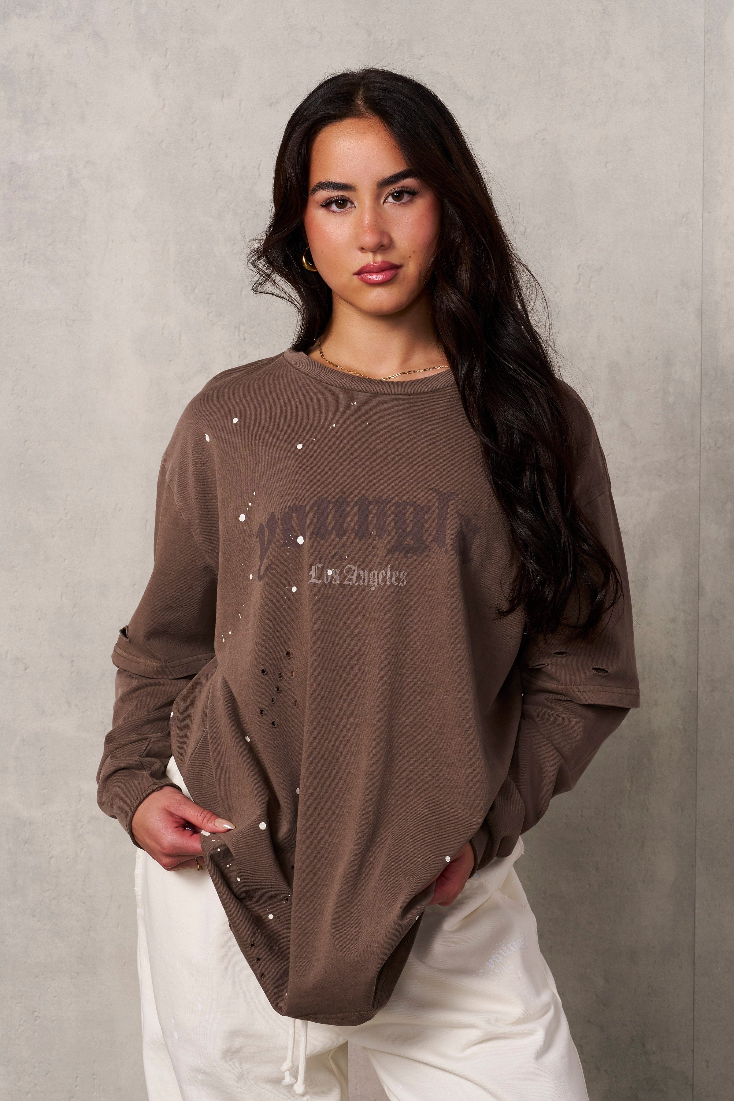 Front view of distressed oversized t-shirt for men in urban style.