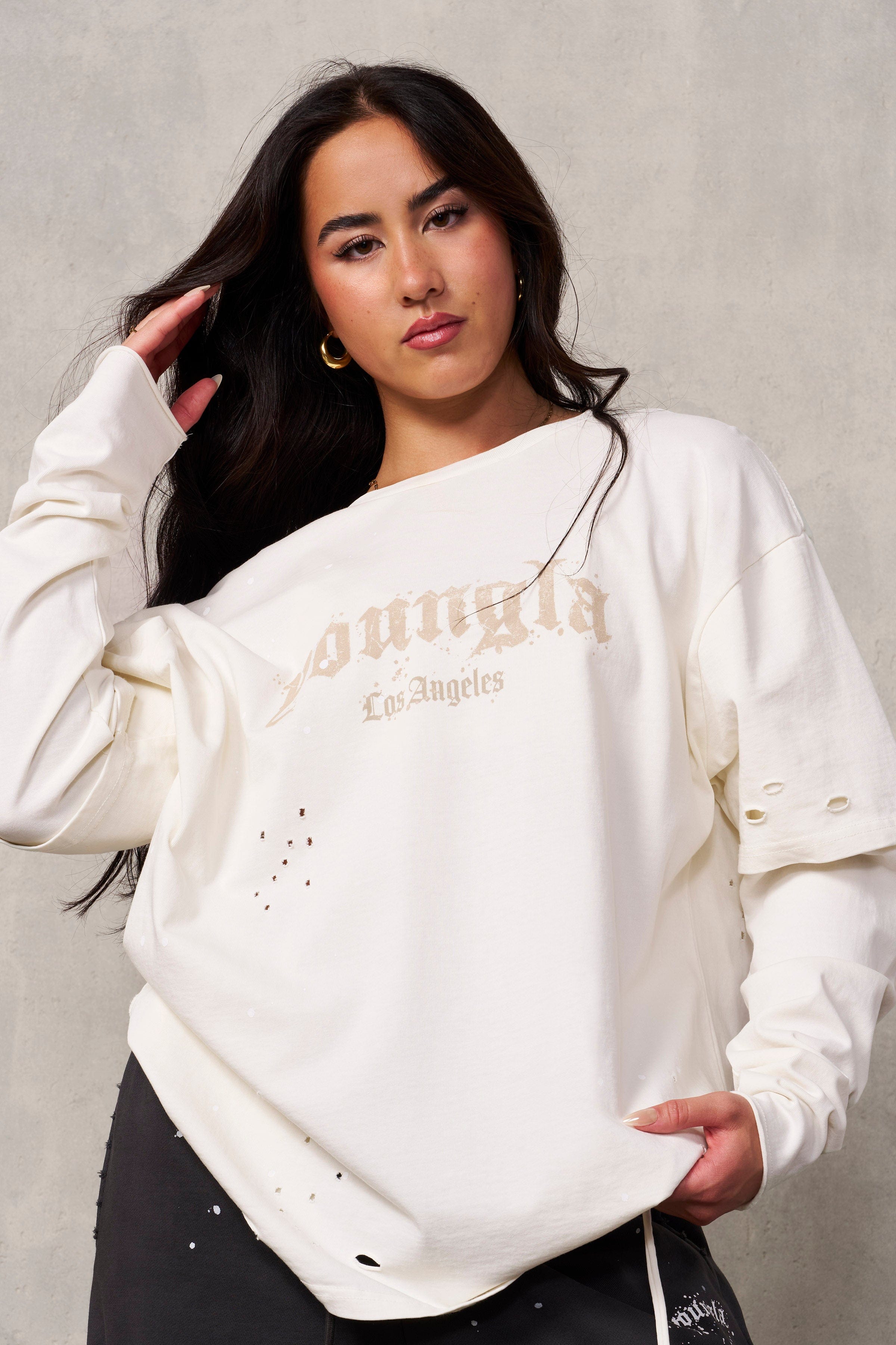 Front view of distressed oversized t-shirt for men in urban style.