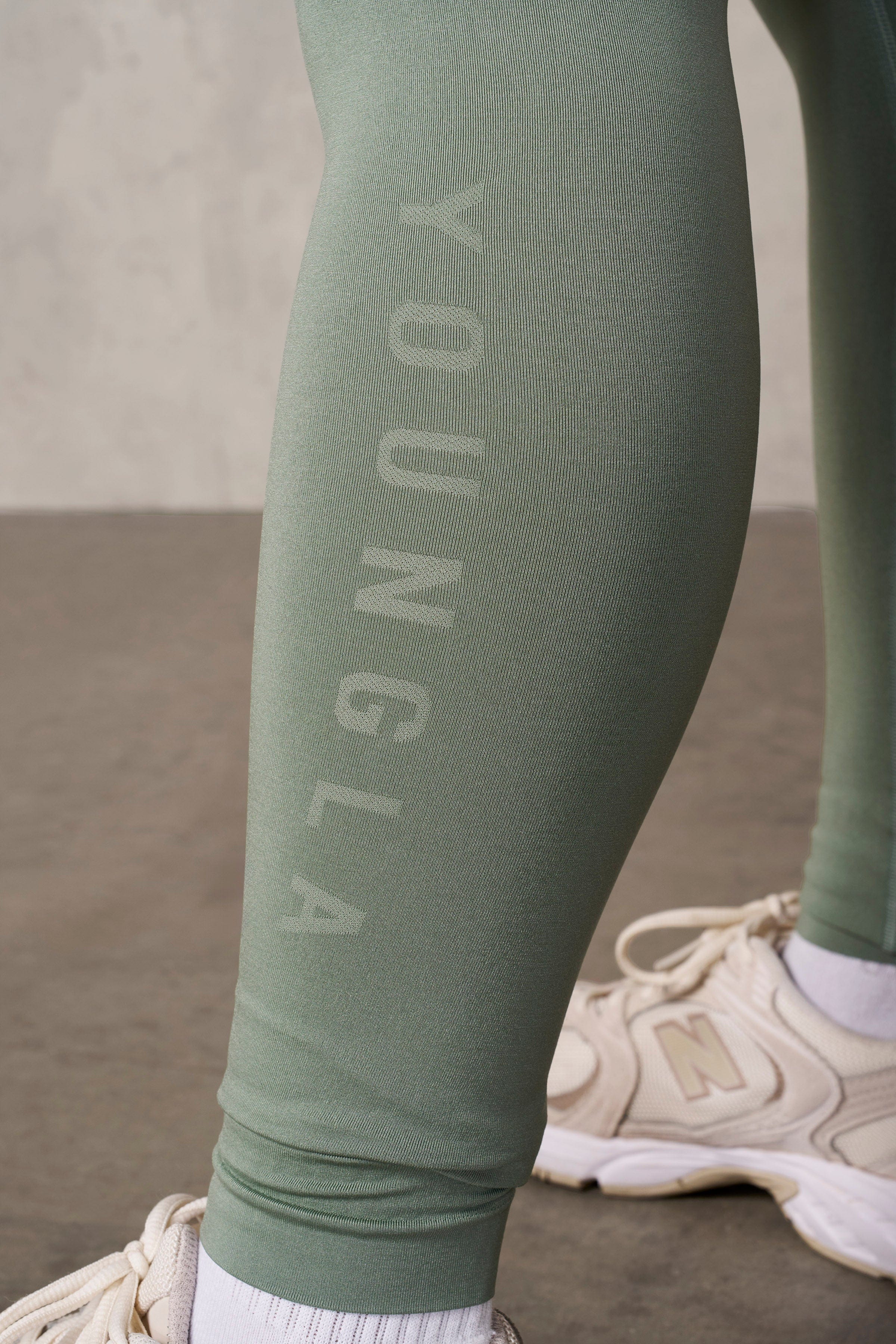 Front view of seamless compression leggings for women during yoga.