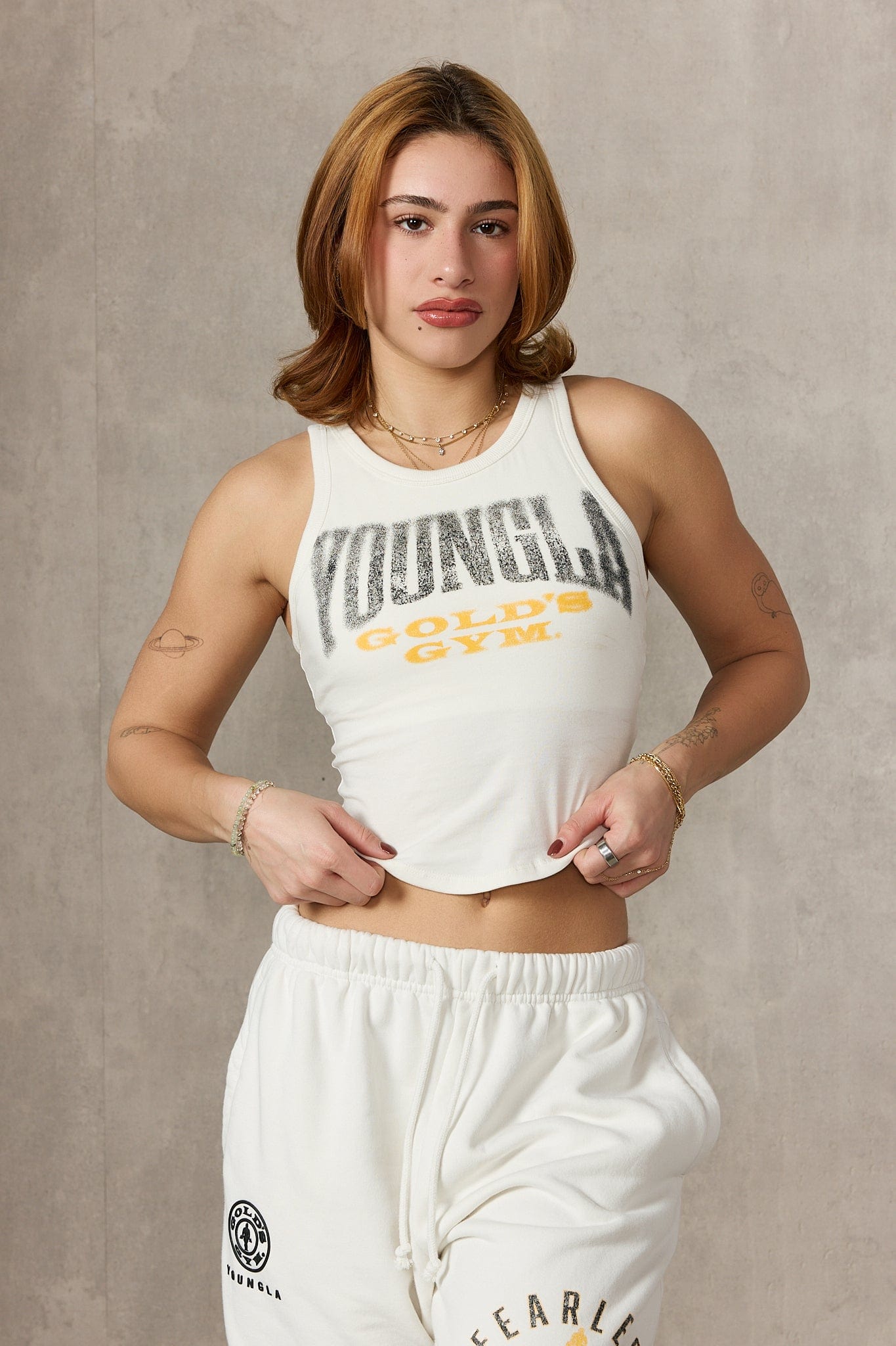 Front view of Golds Gym tank top on a model showcasing its fit.
