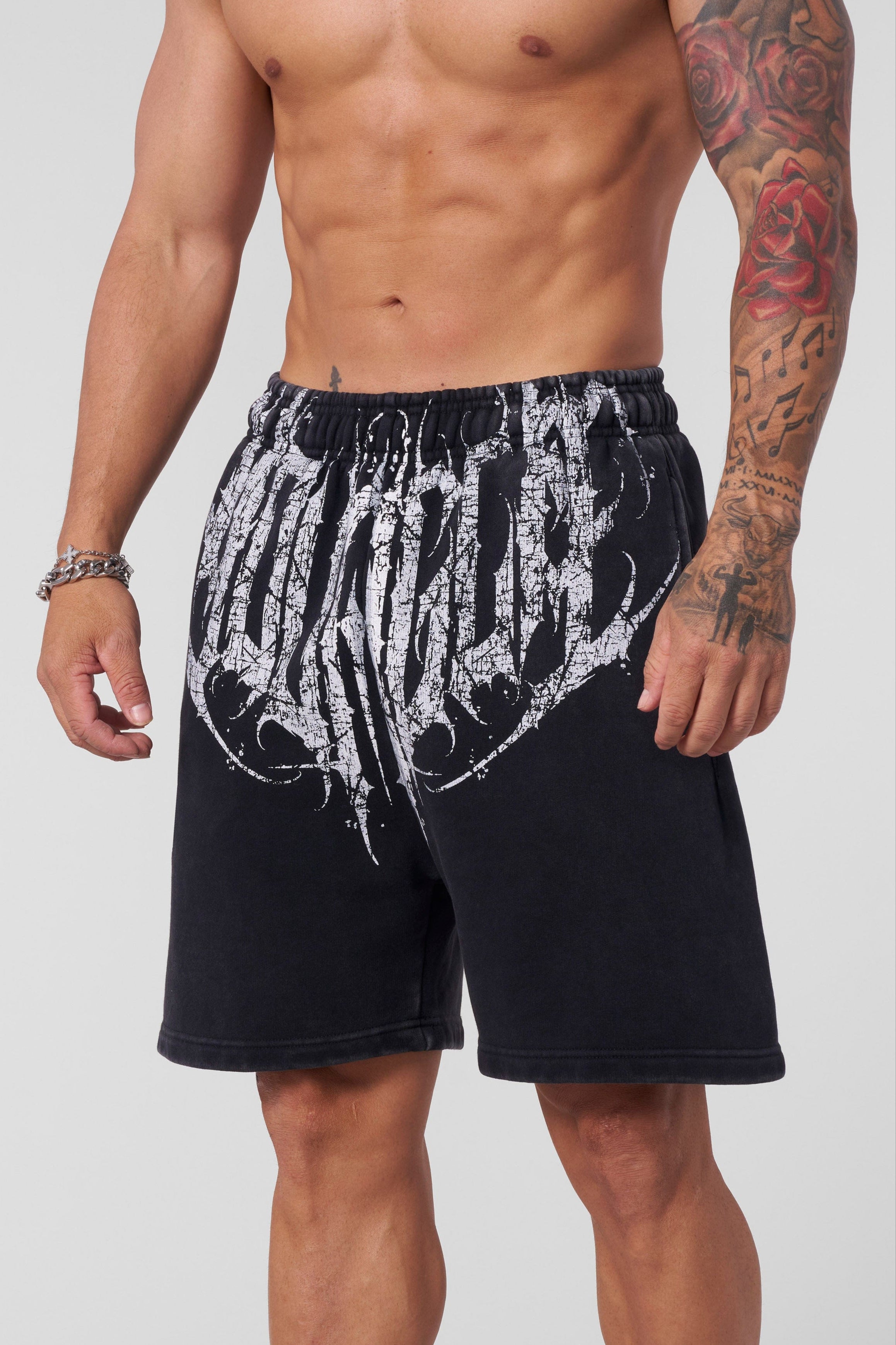 Close-up of Dark Wave baggy shorts showcasing acid-washed finish.