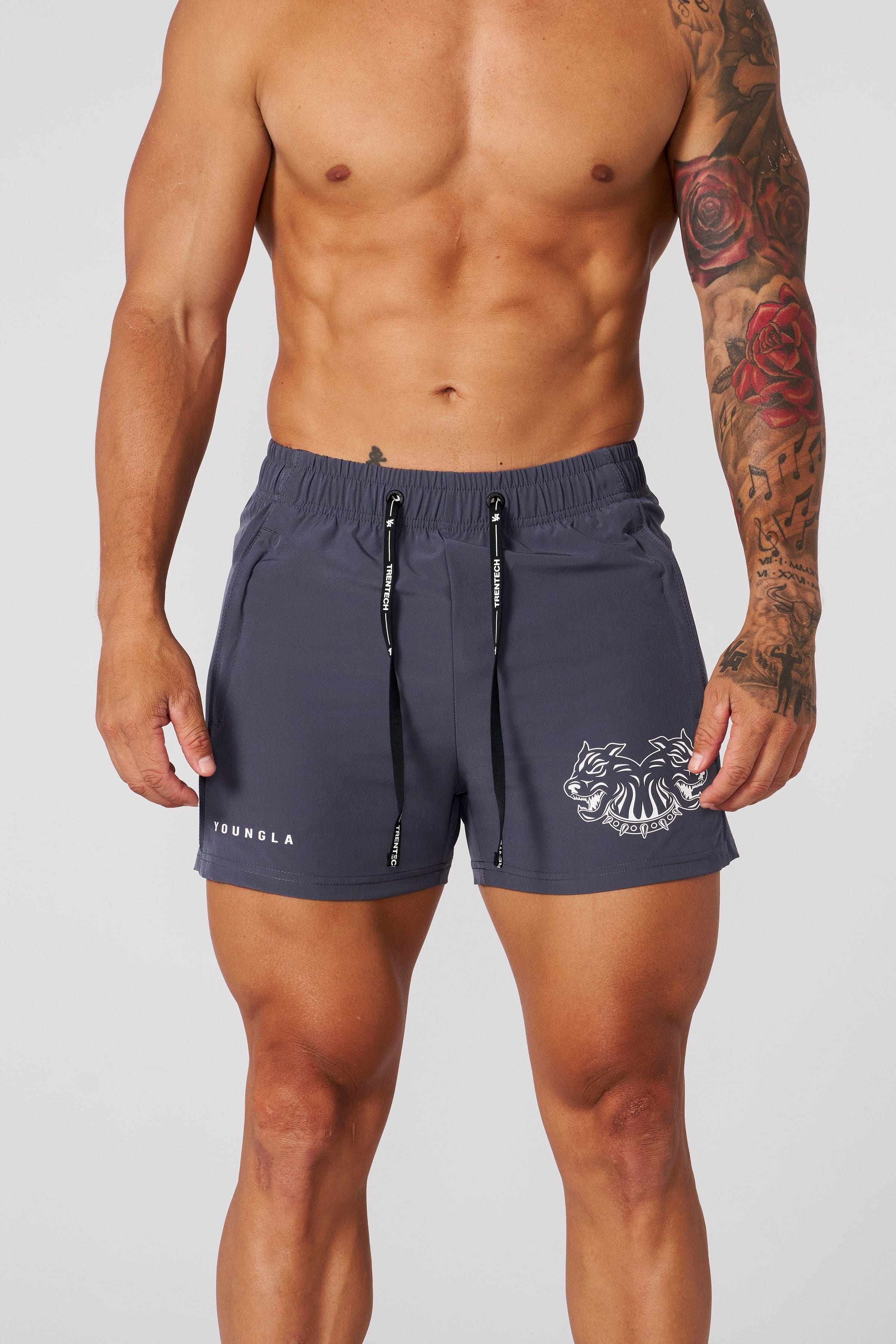 Side angle of mens workout shorts emphasizing quad muscle fit