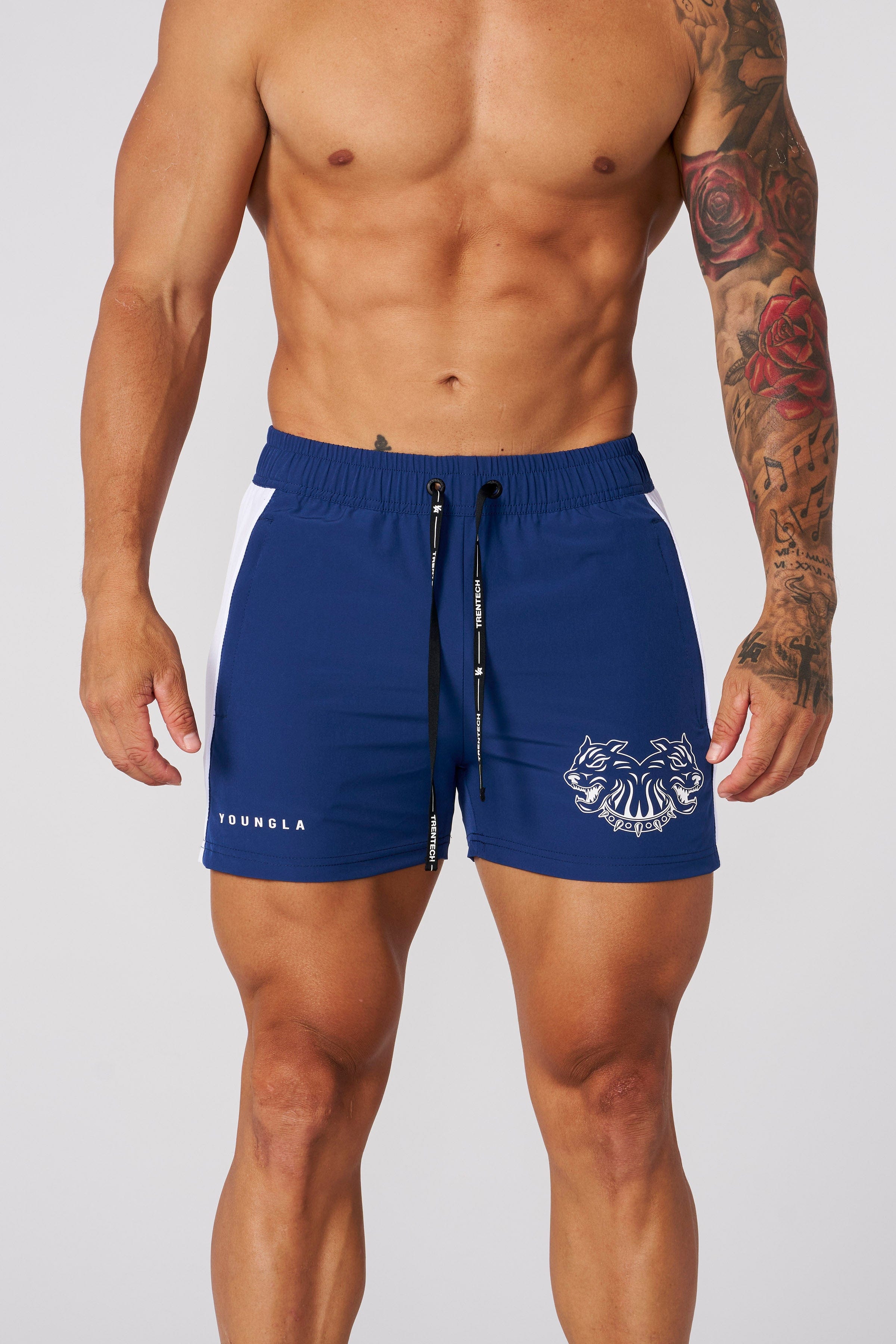 Front view of quad reveal shorts highlighting the fitted design and mesh panel