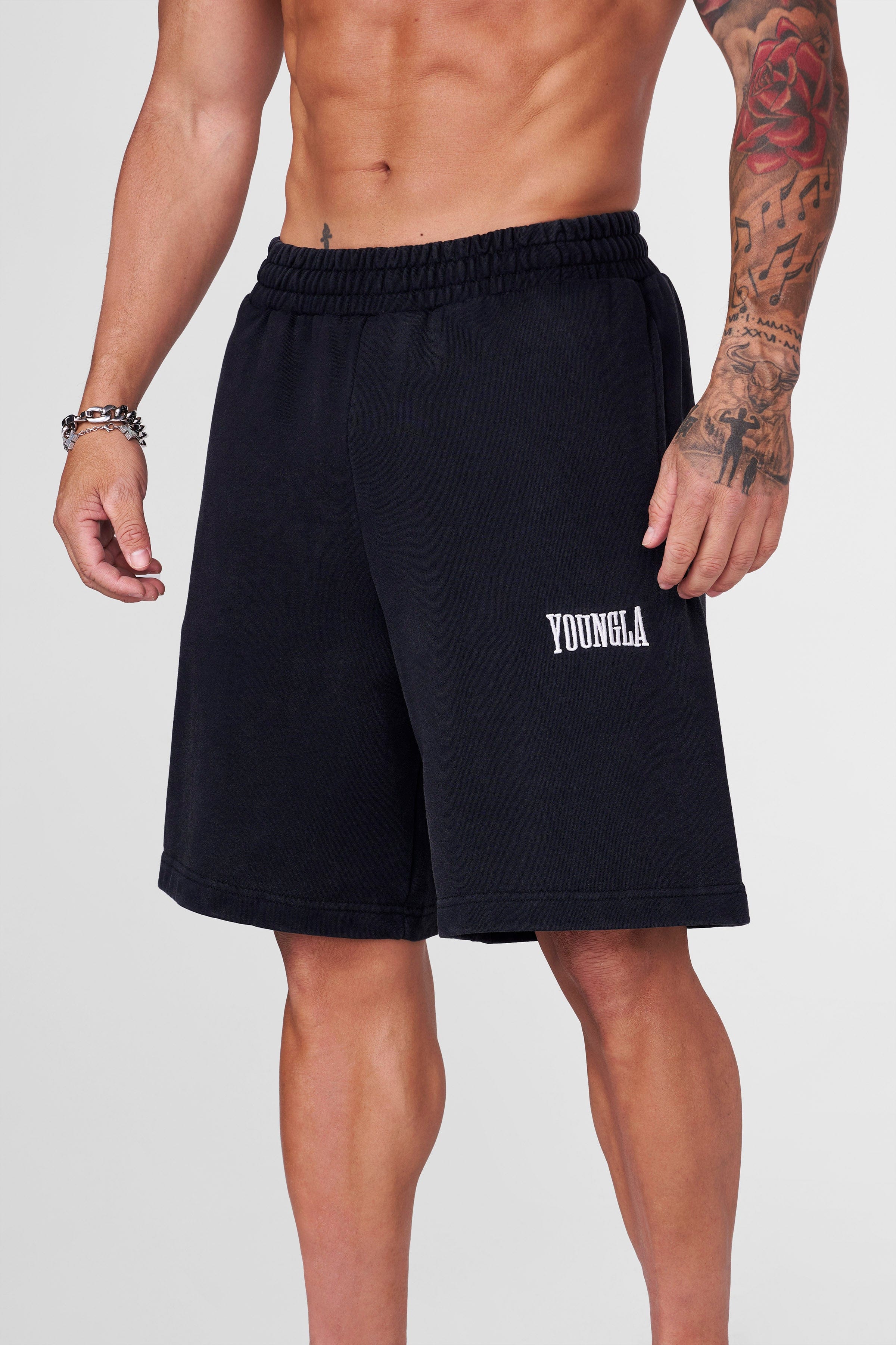 Heritage baggy shorts laid out on a casual outdoor setting, showing the oversized relaxed fit