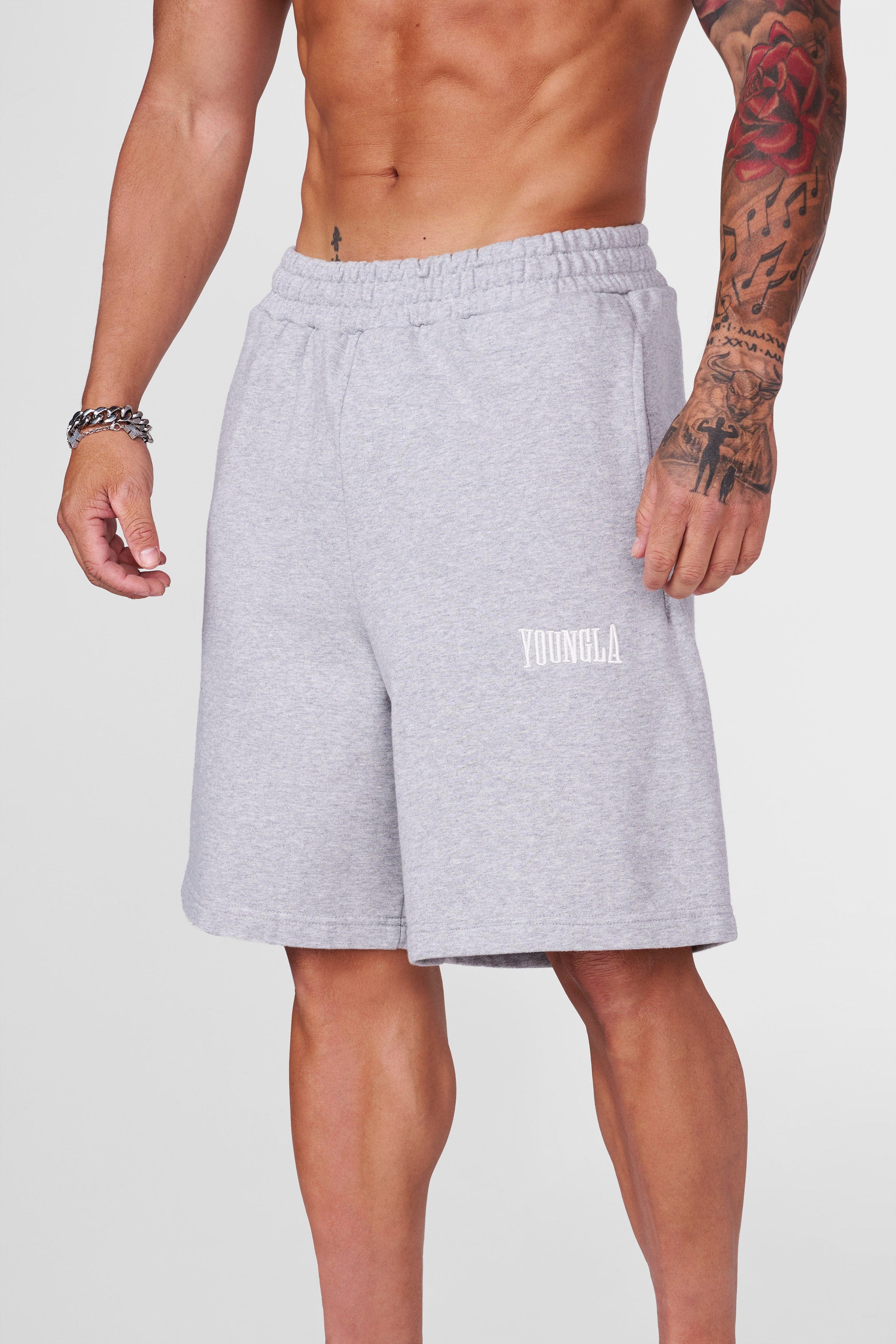 Model wearing Heritage baggy shorts with a casual top, highlighting the comfortable cotton fabric