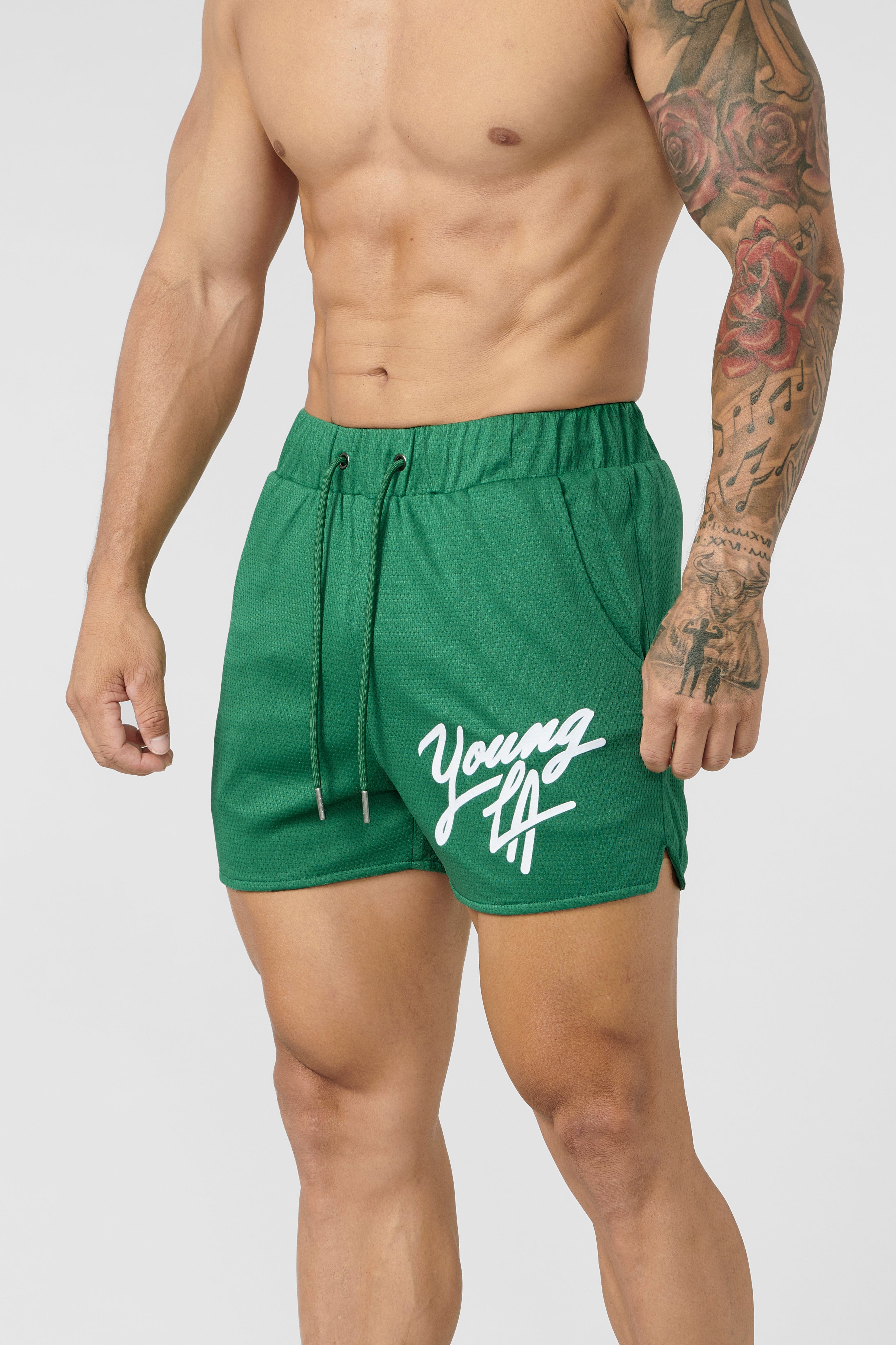 Side profile view showing pocket placement on womens workout shorts