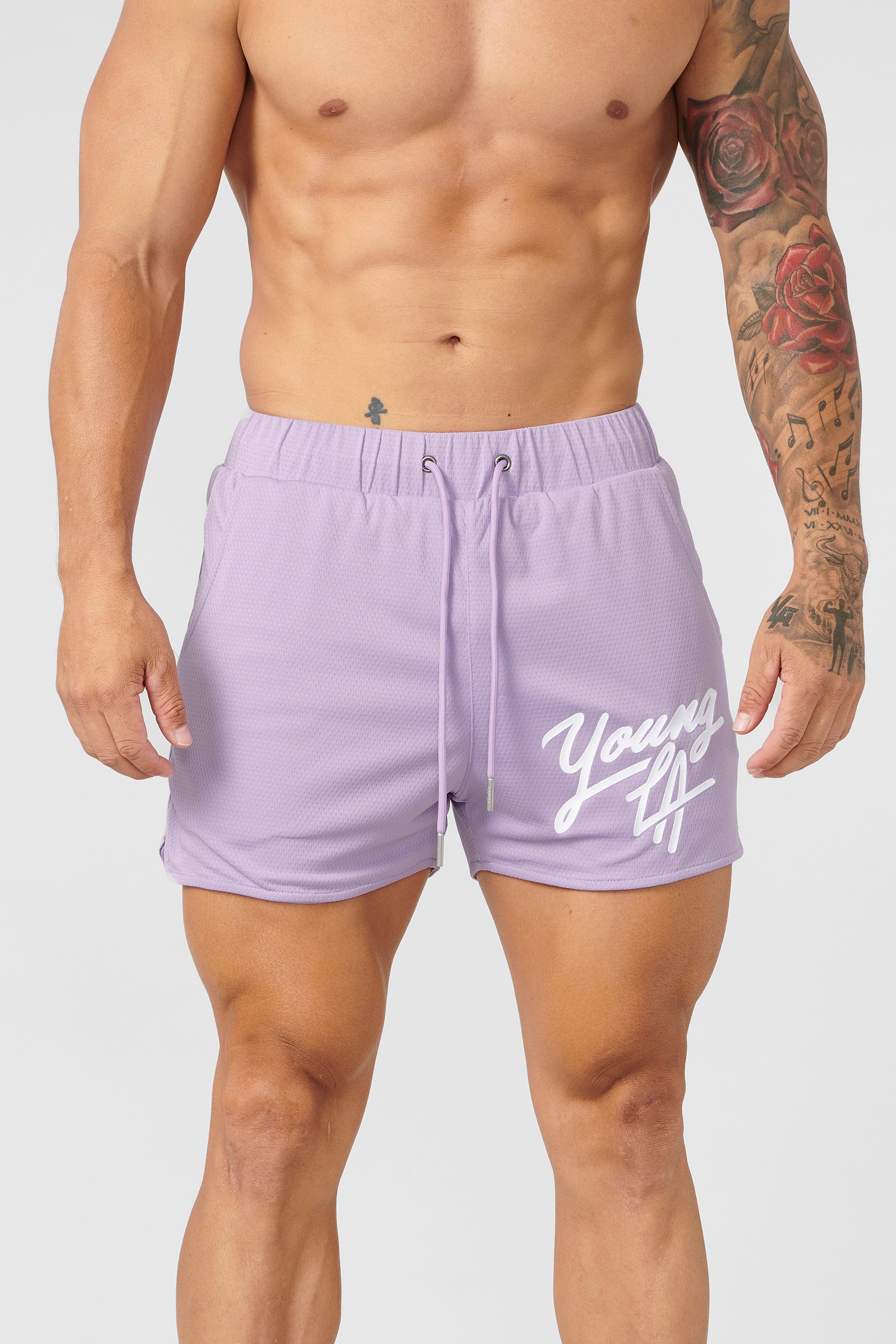 Gray mens workout shorts on hanger showing waistband detail