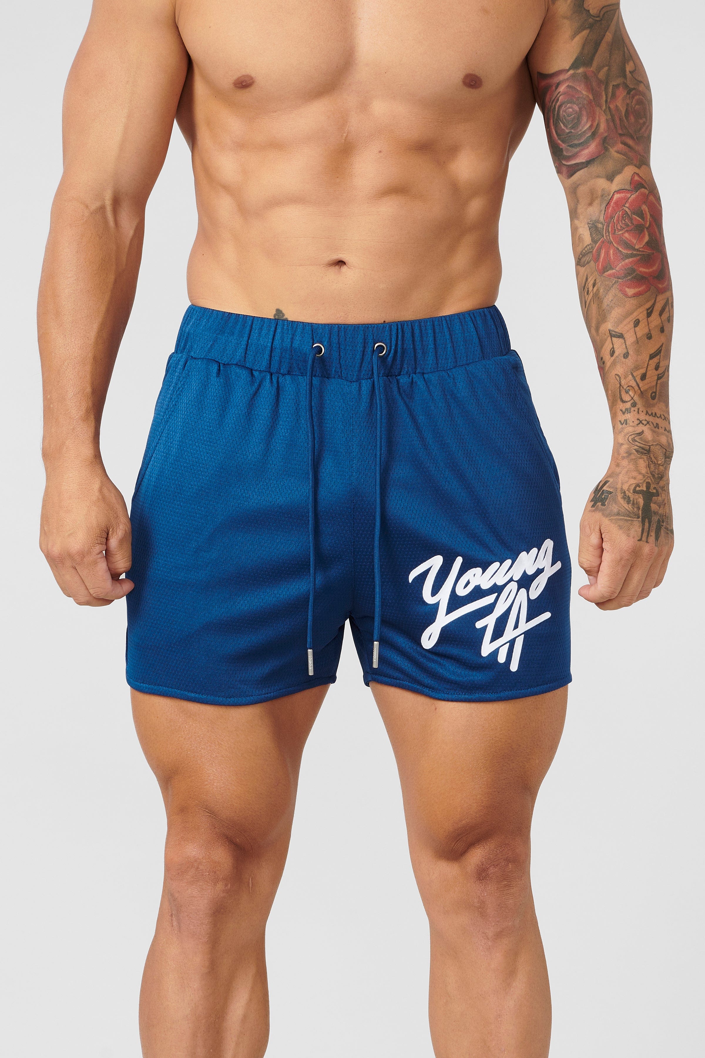 Gray men's workout shorts on hanger showing waistband detail