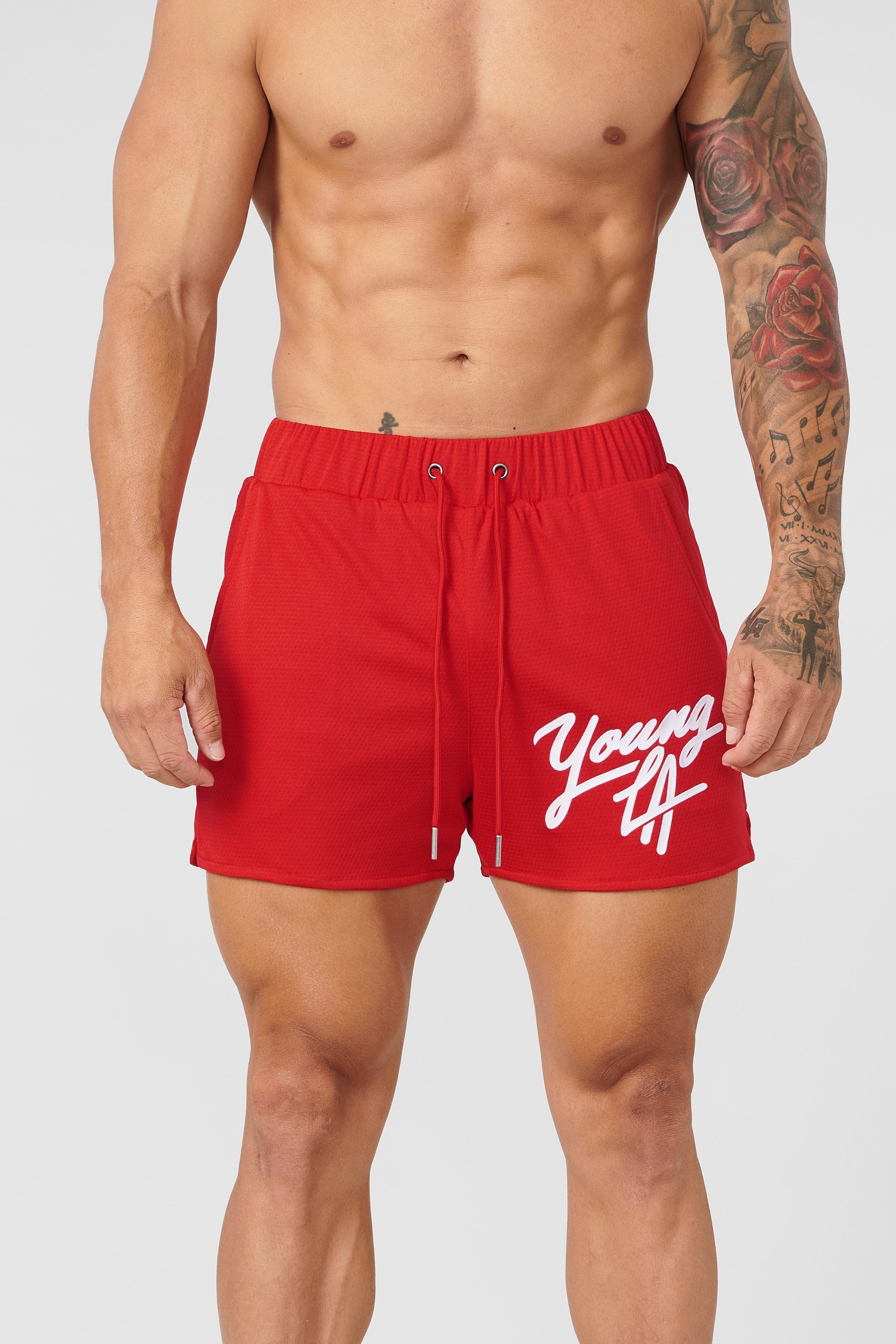 Side profile view showing pocket placement on womens workout shorts
