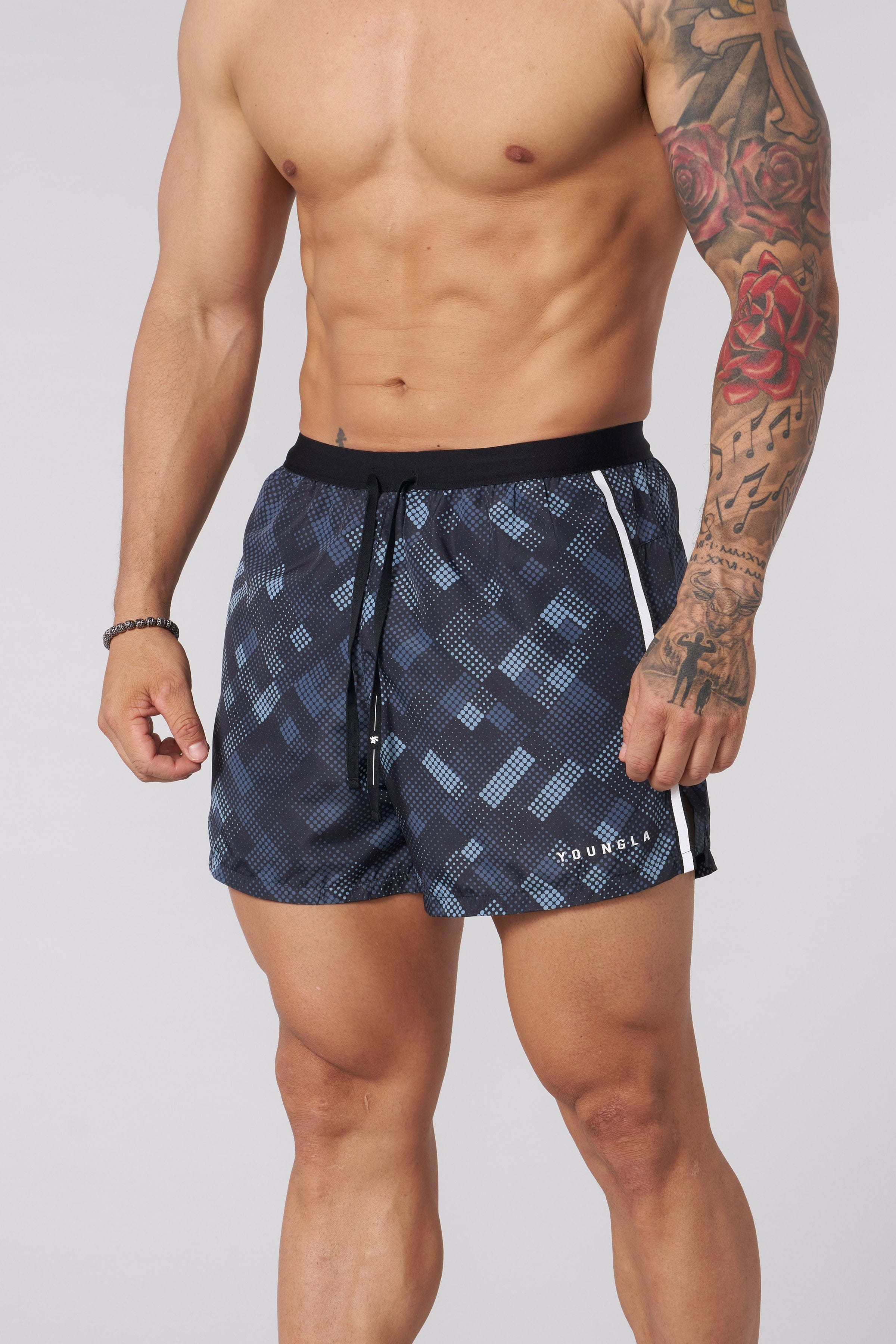 Side view showcasing reflective piping on running shorts
