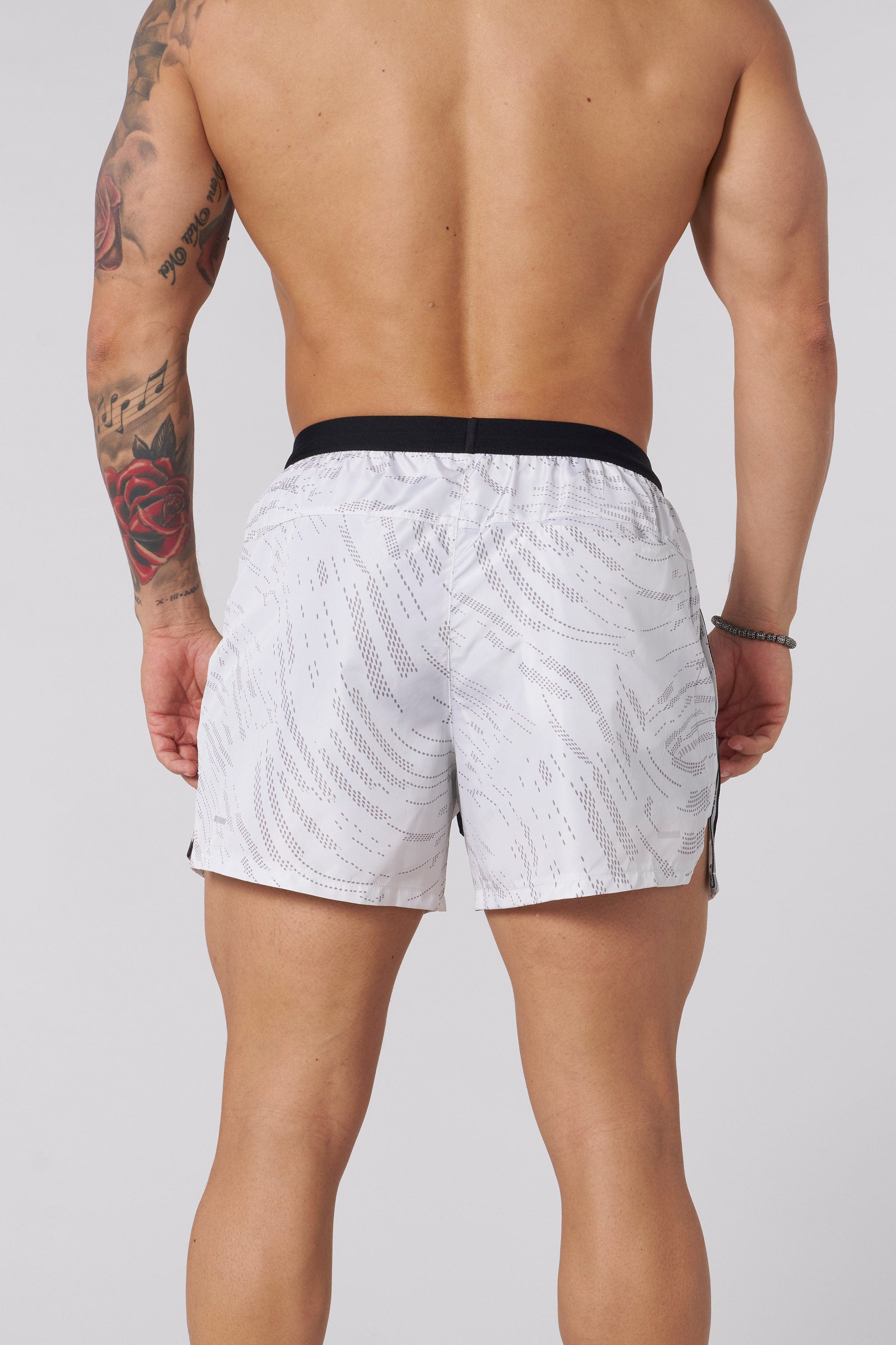 Model wearing ultra running shorts during a morning jog
