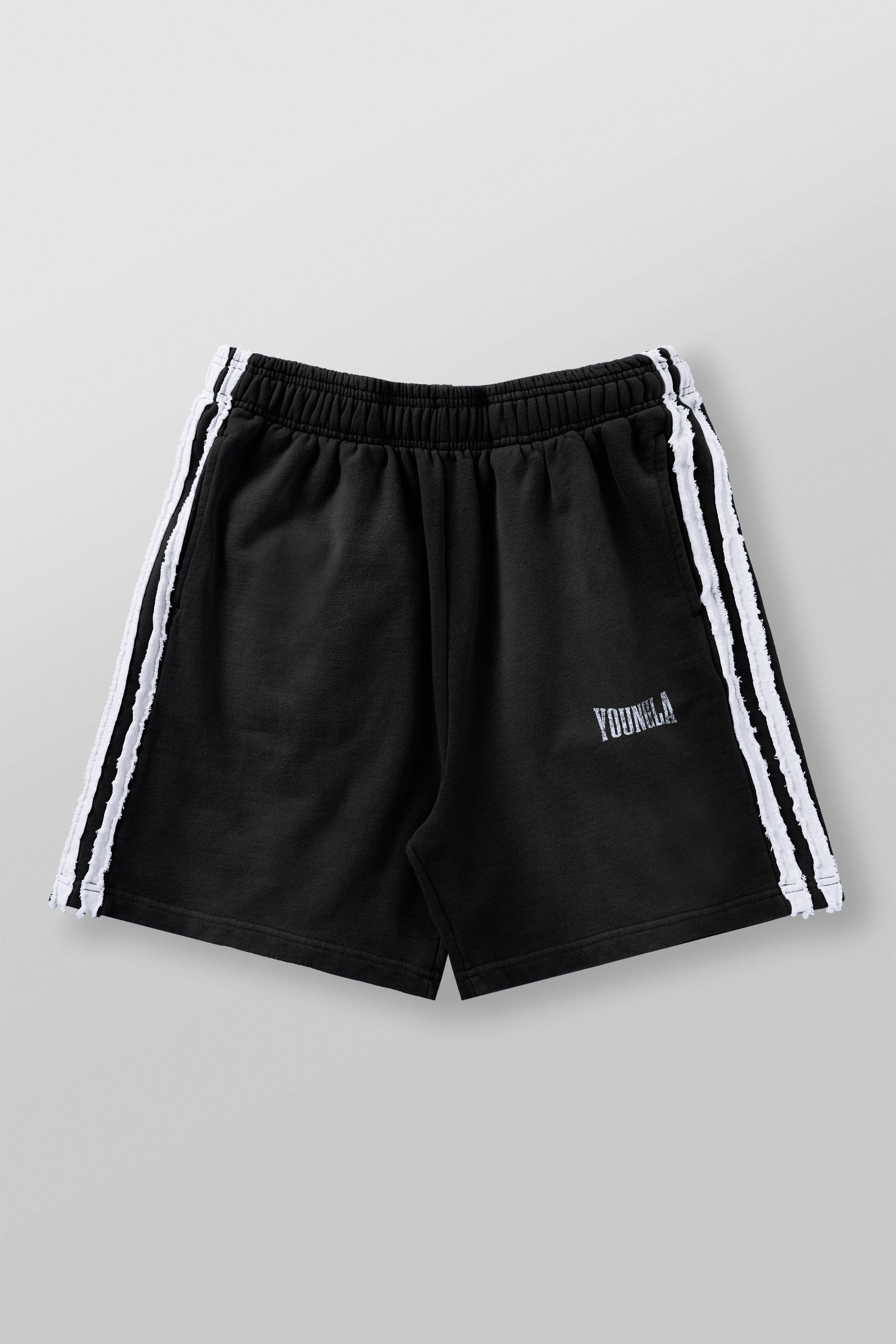 Model wearing striped sweat shorts, ideal for casual outings or workouts.