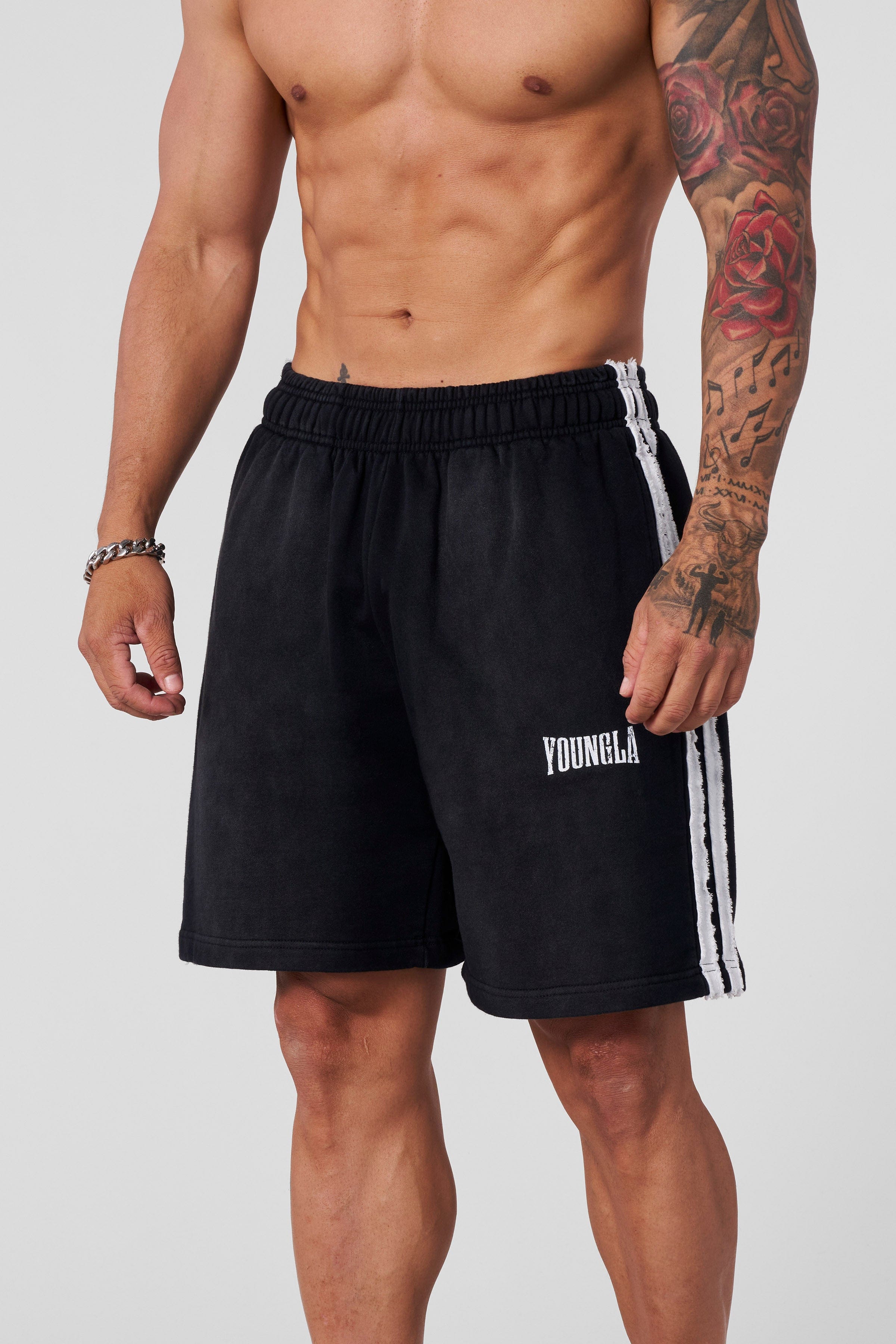 Front view of retro striped sweat shorts for women, showcasing the unique design.