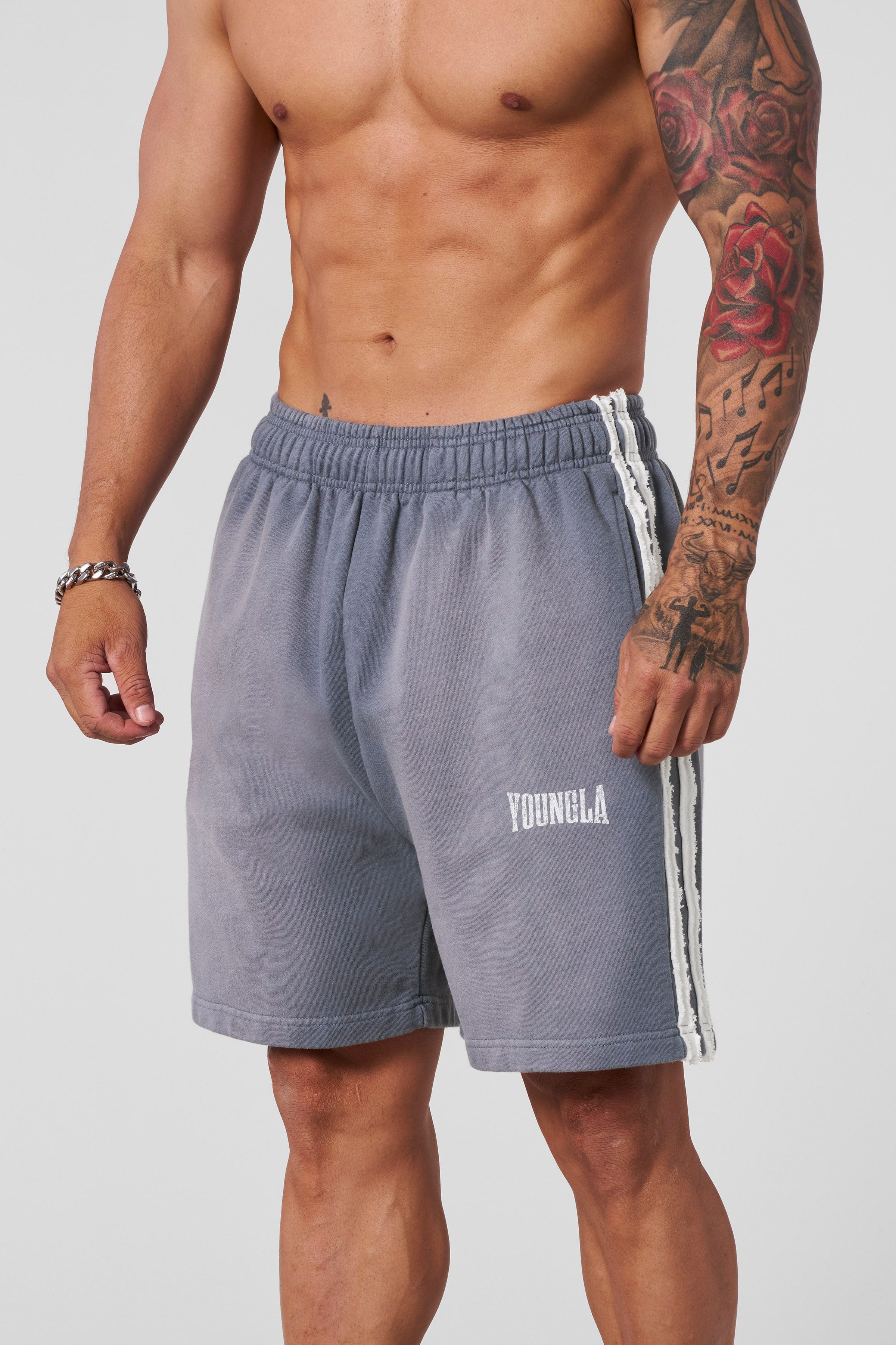 Front view of retro striped sweat shorts for women, showcasing the unique design.
