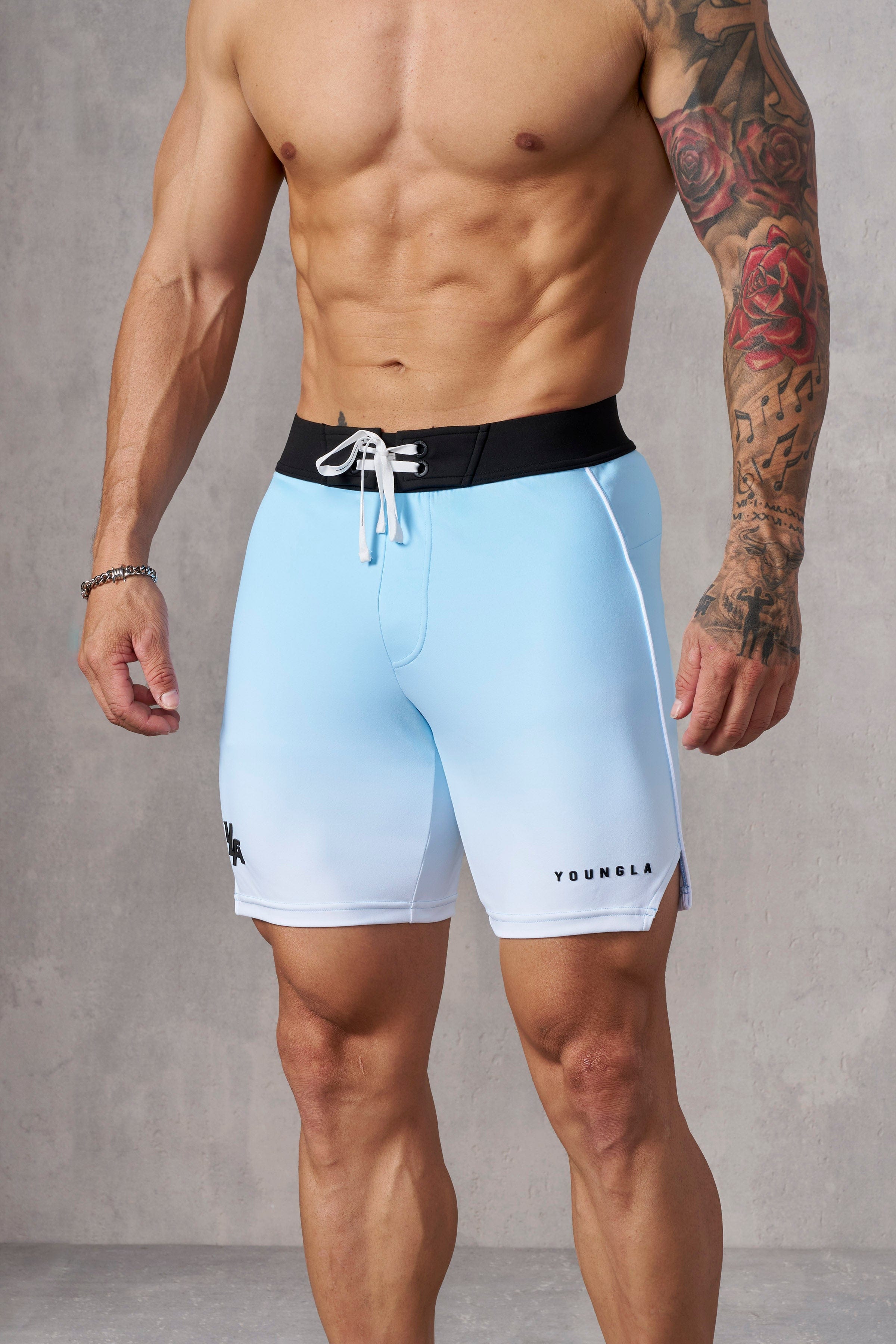 Front view of men's physique competition shorts showcasing fit and design.