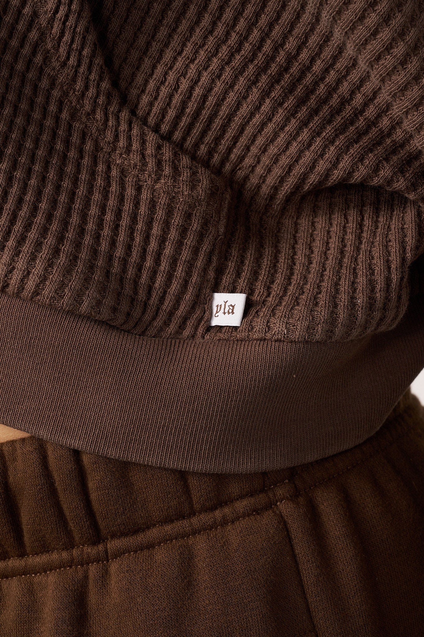 Close-up of textured cotton fabric and sturdy zipper
