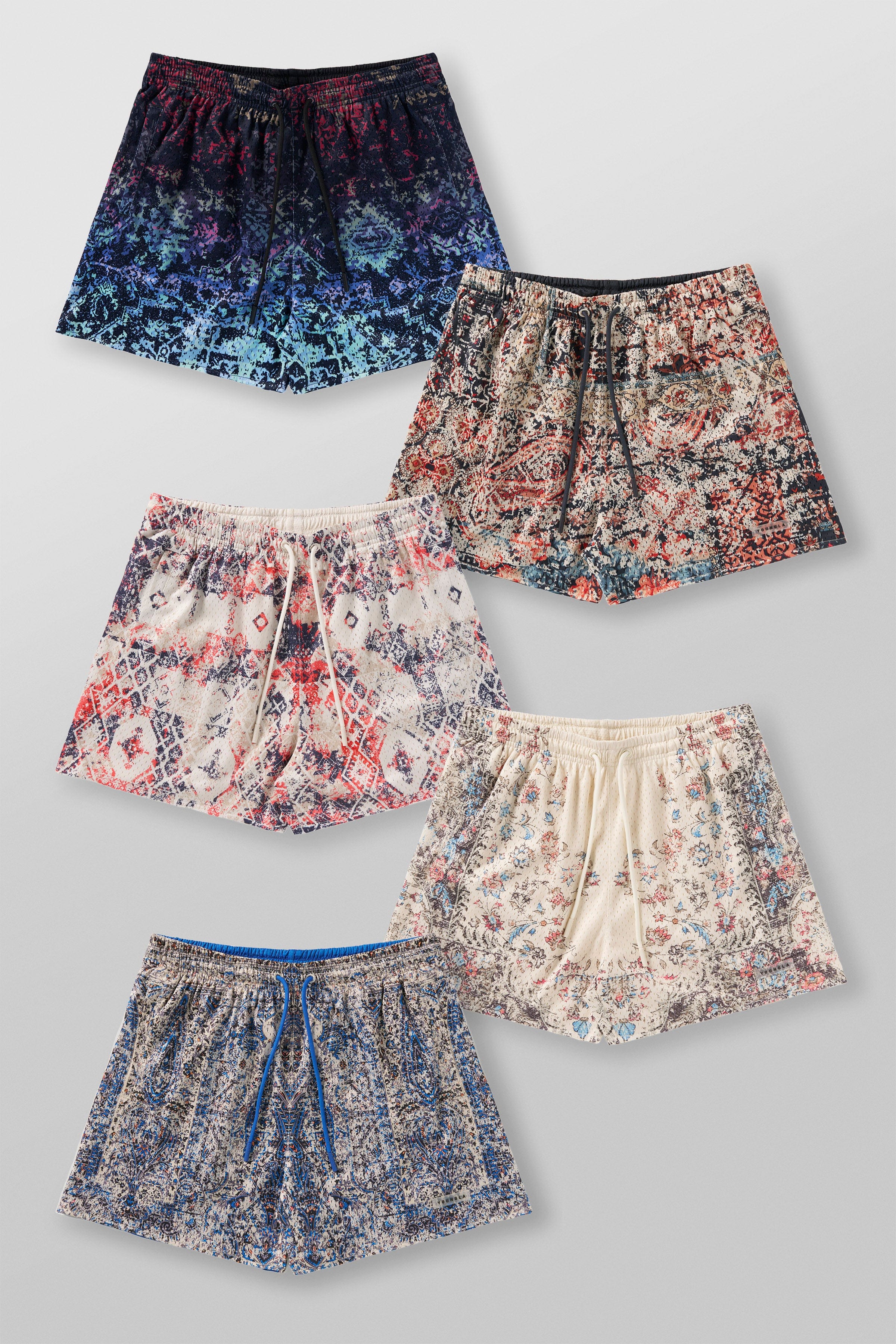 Front view of Persian rug mesh shorts in a natural setting.