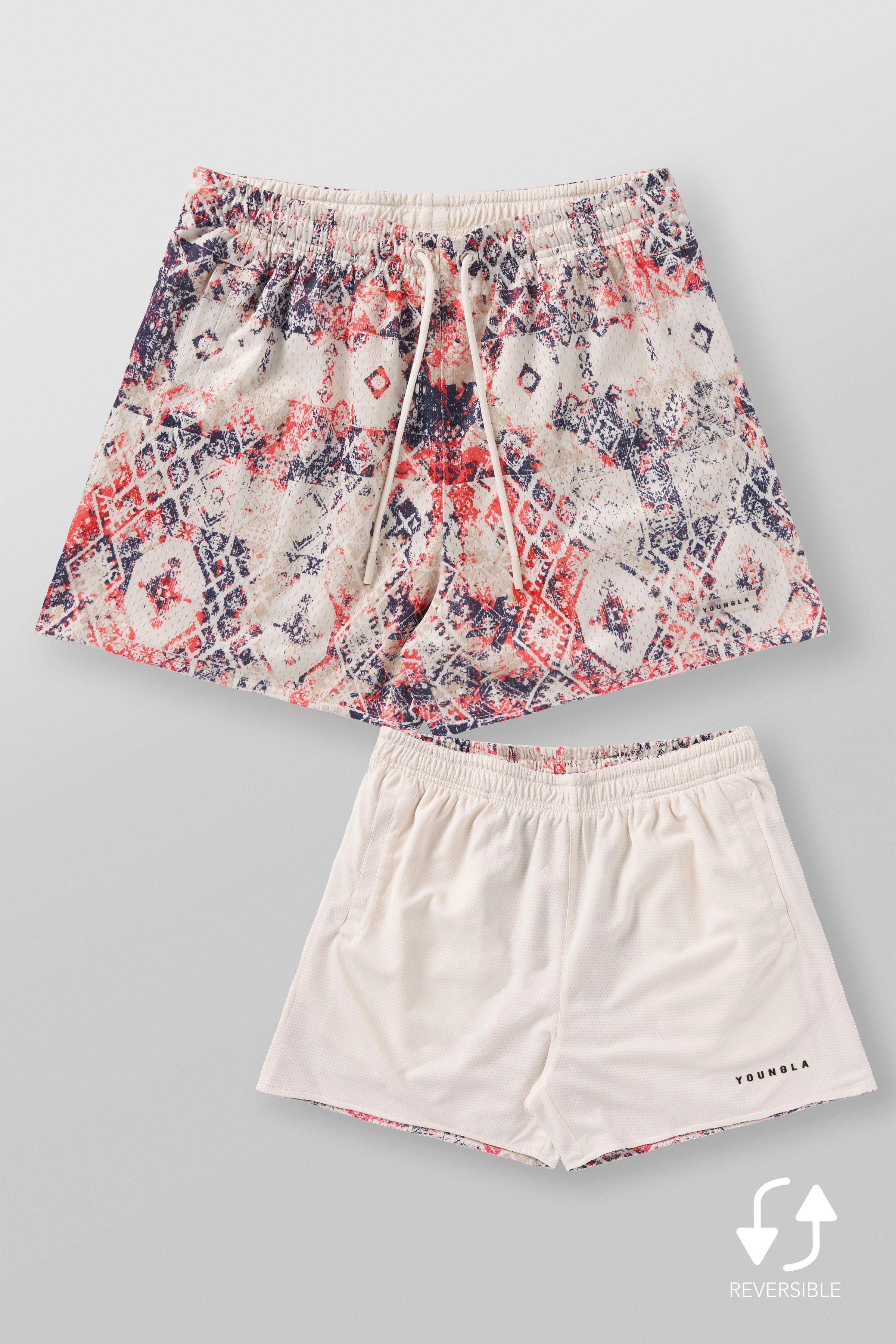 Front view of Persian rug mesh shorts in a natural setting.