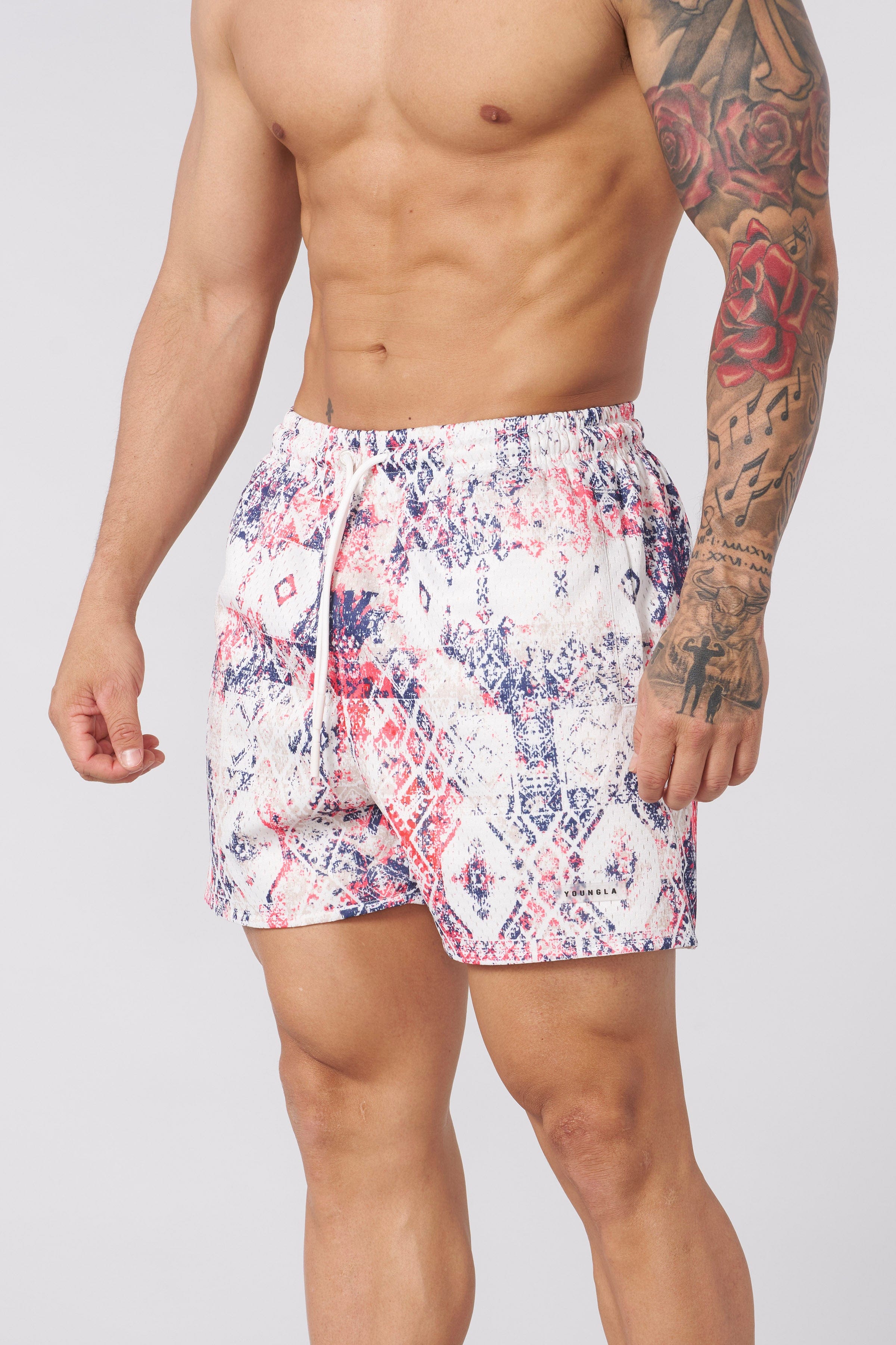 Side view of reversible shorts showcasing elegant design.