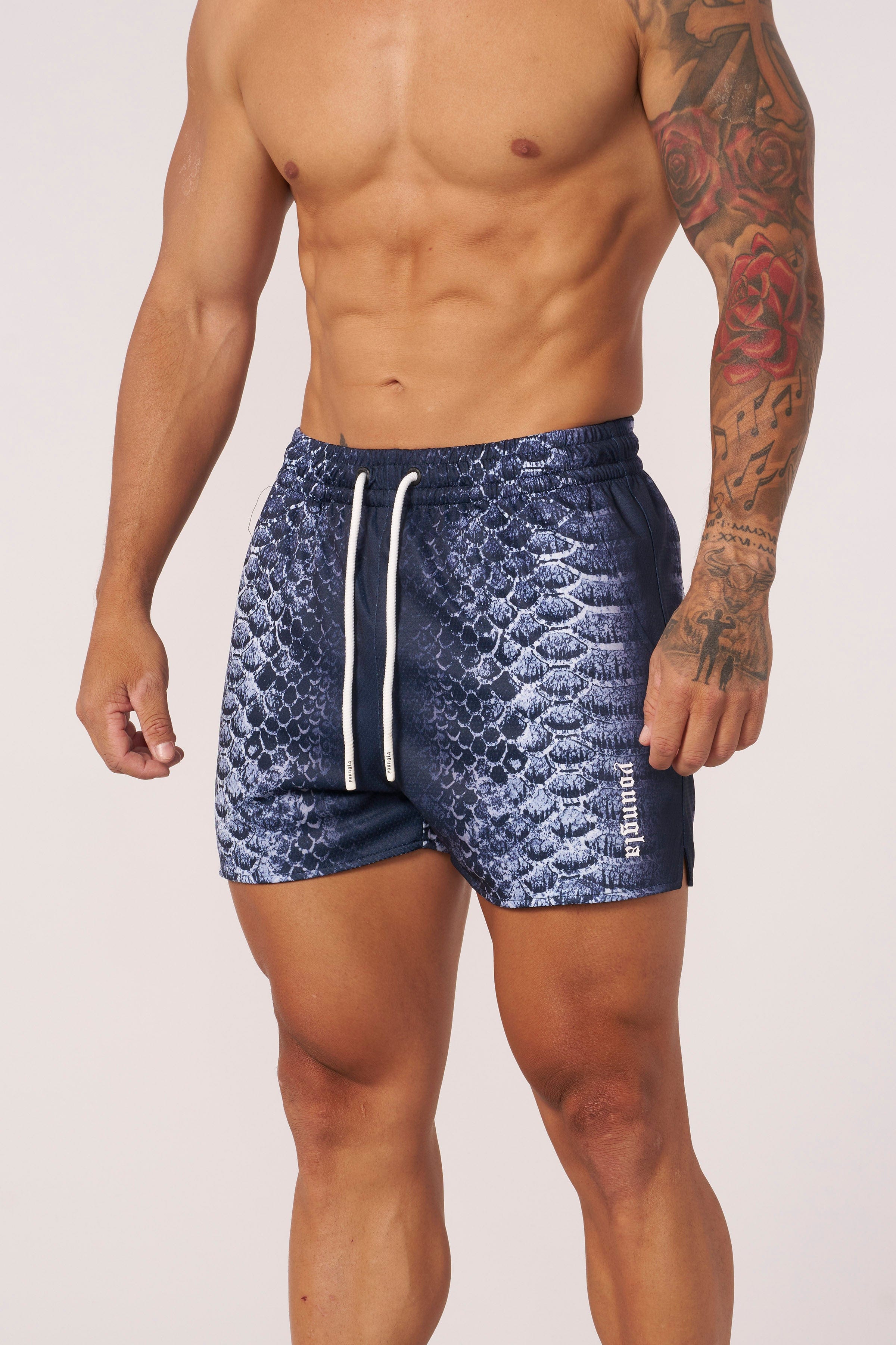 Front view of reversible animal print mesh shorts for men, showcasing the vibrant design.