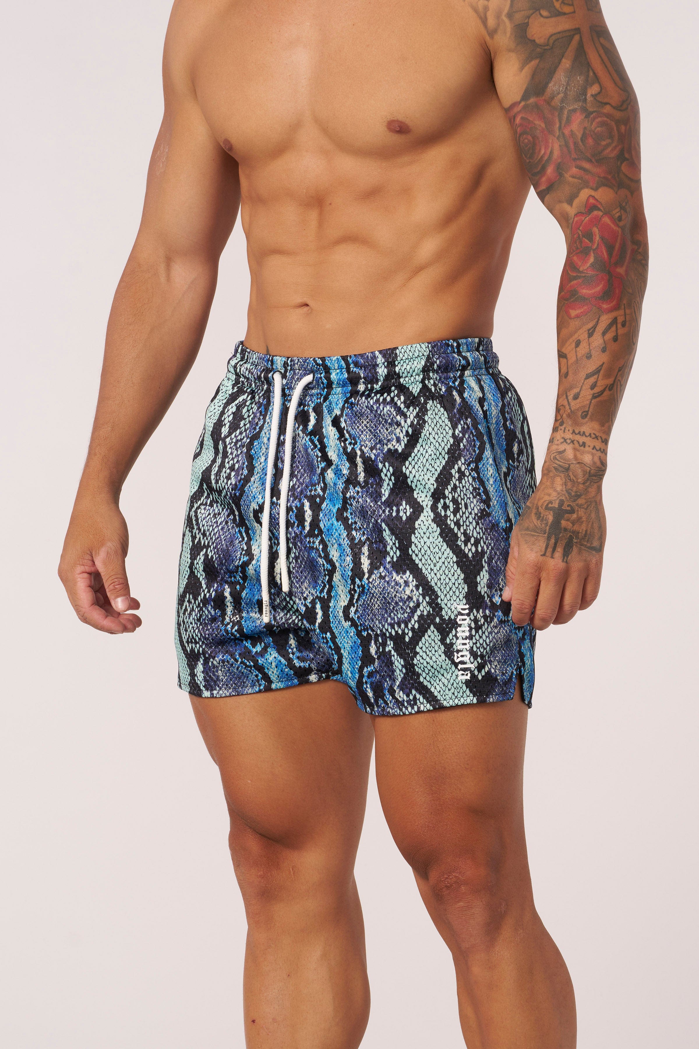 Model wearing reversible animal print shorts, demonstrating their comfortable fit.
