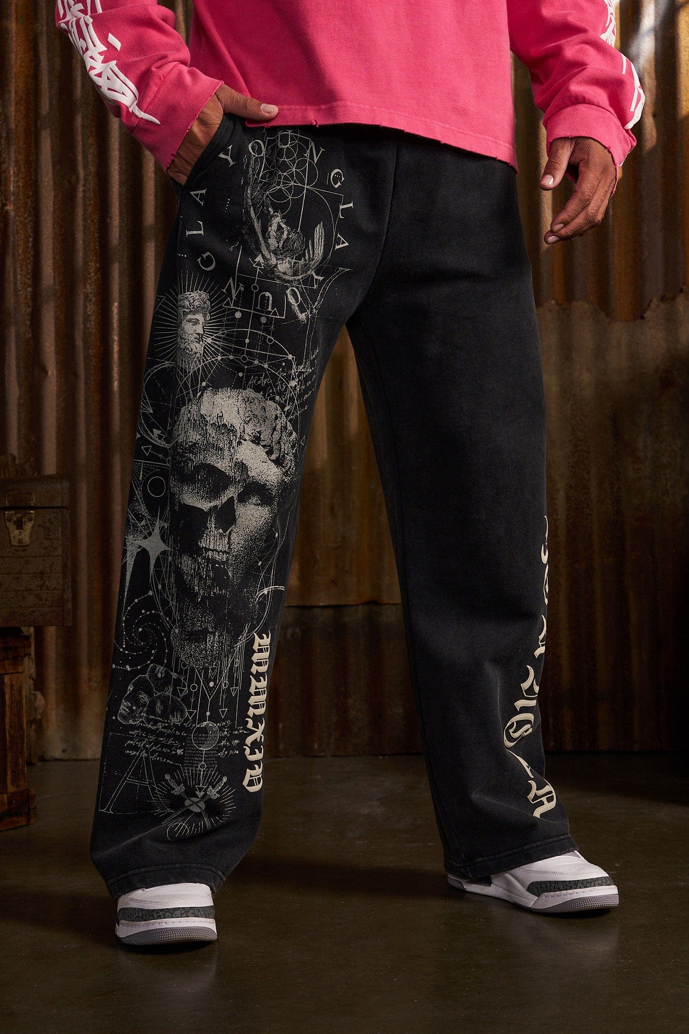 Relaxed fit cotton French terry sweats with bold graphic design, side angle
