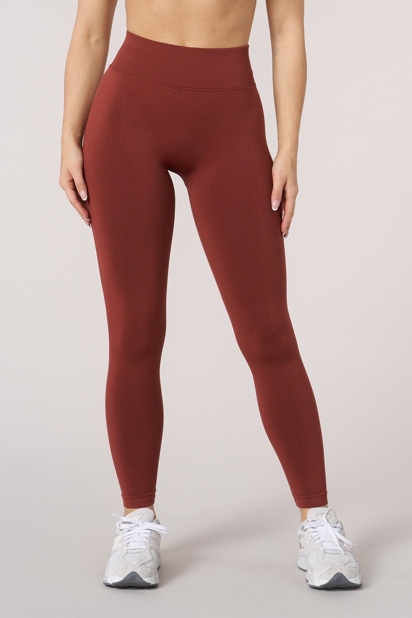 Seamless high-waisted leggings with scrunch back design in black, ideal for activewear.