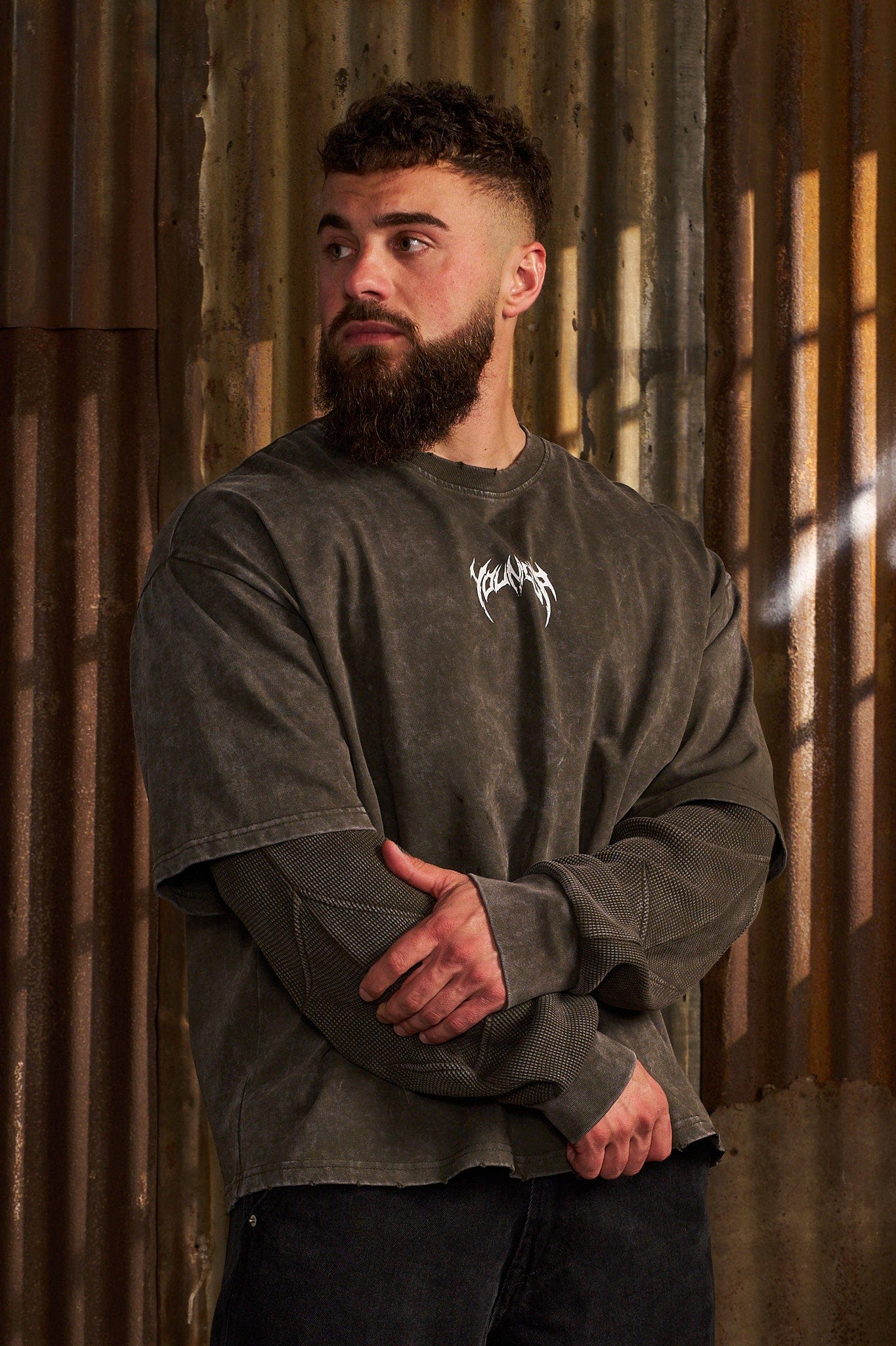 Model wearing Shadow Twofer Long Sleeve T-Shirt in a casual setting.