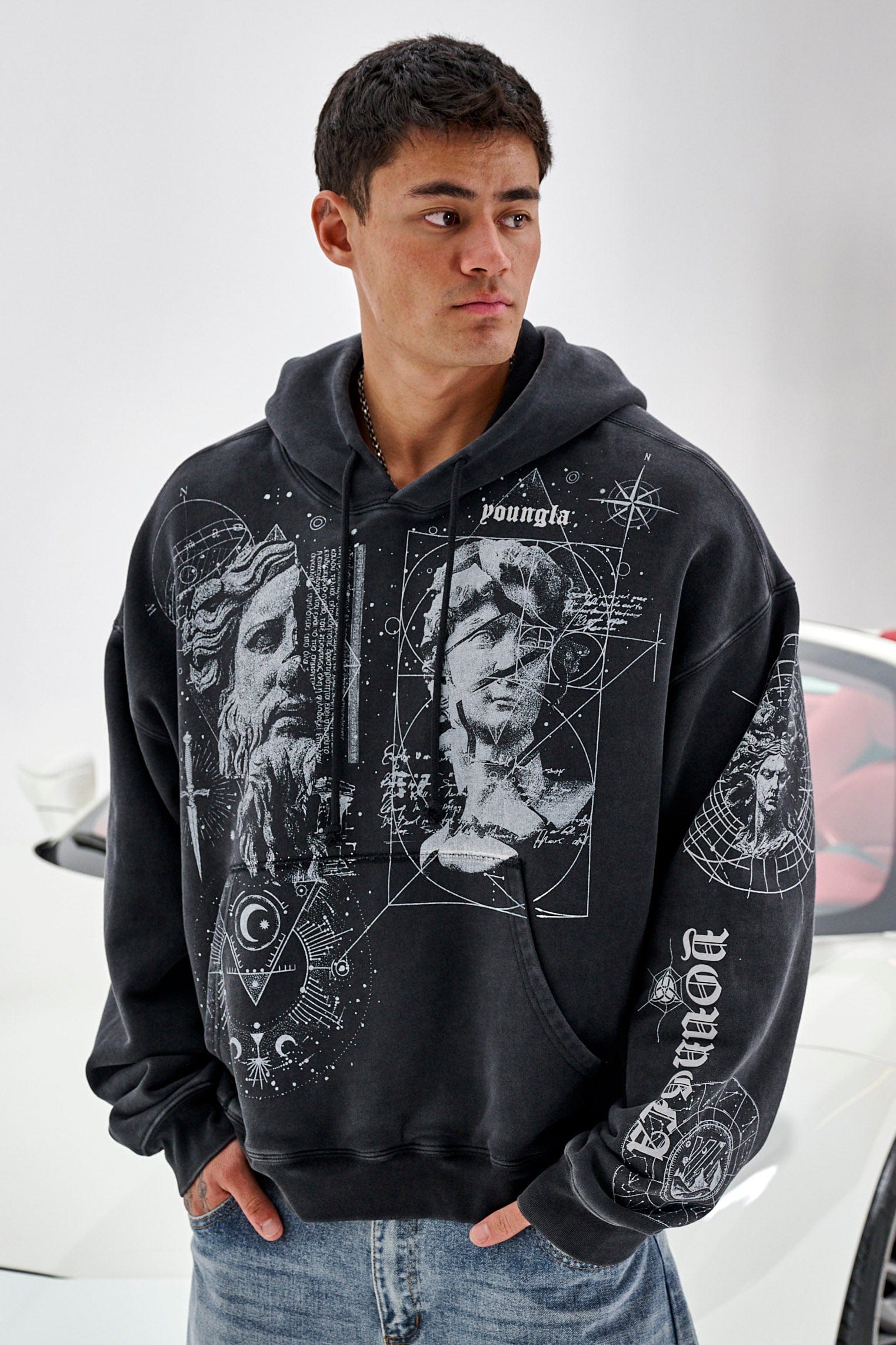 Close-up of tattoo-inspired artwork printed across the entire body of the hoodie
