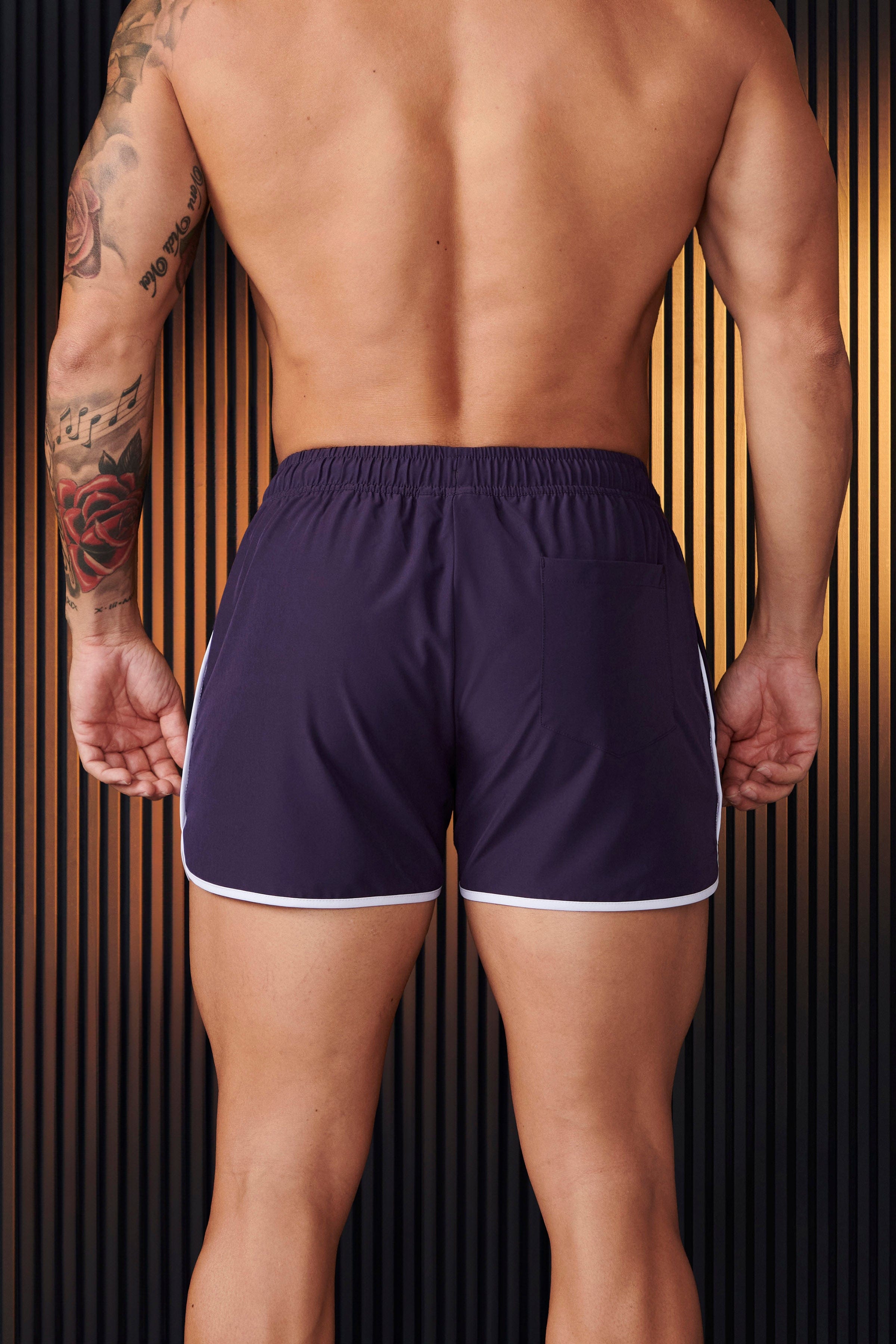 Athlete running in Olympic workout shorts