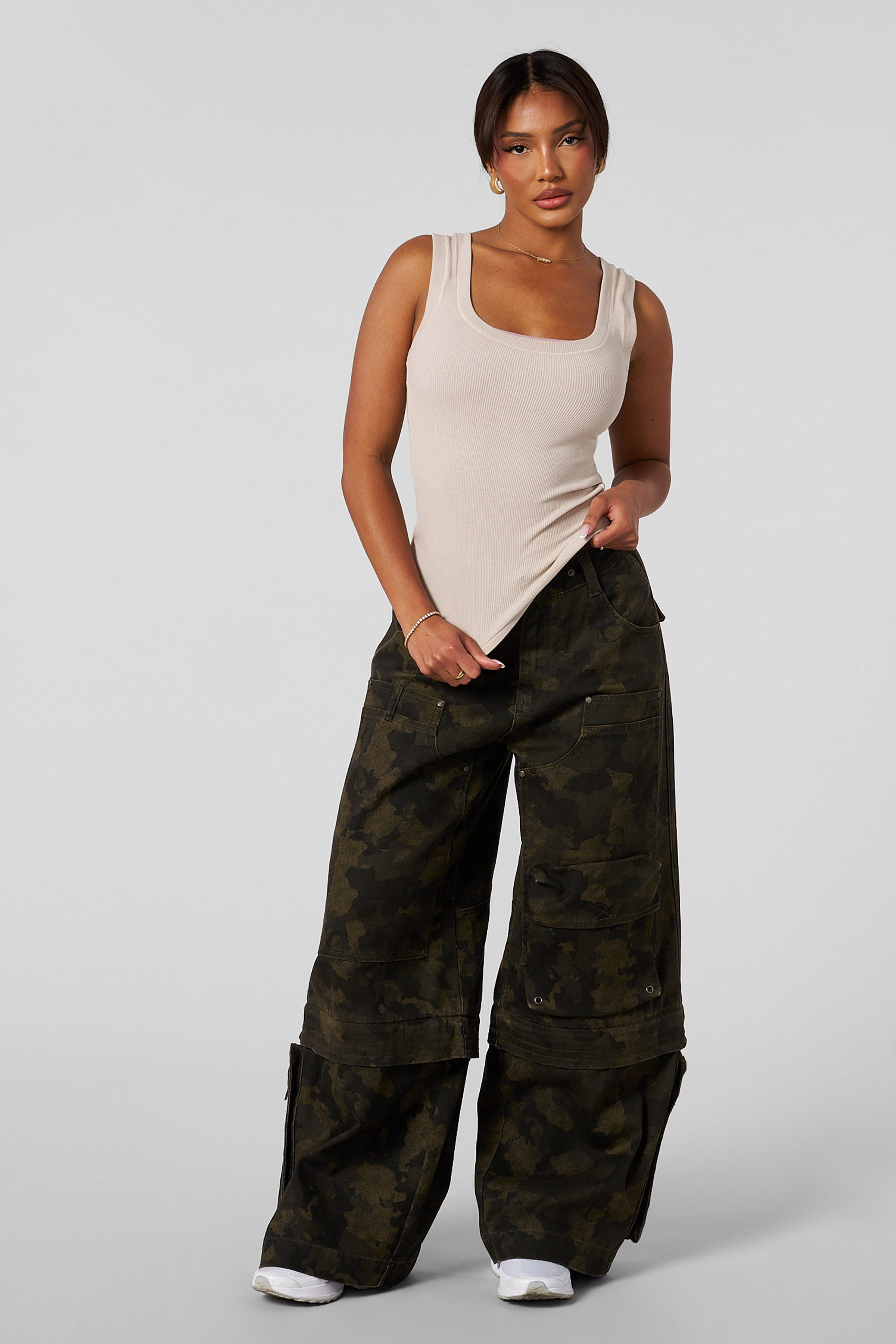 Side profile of ribbed tank tops for women in natural light