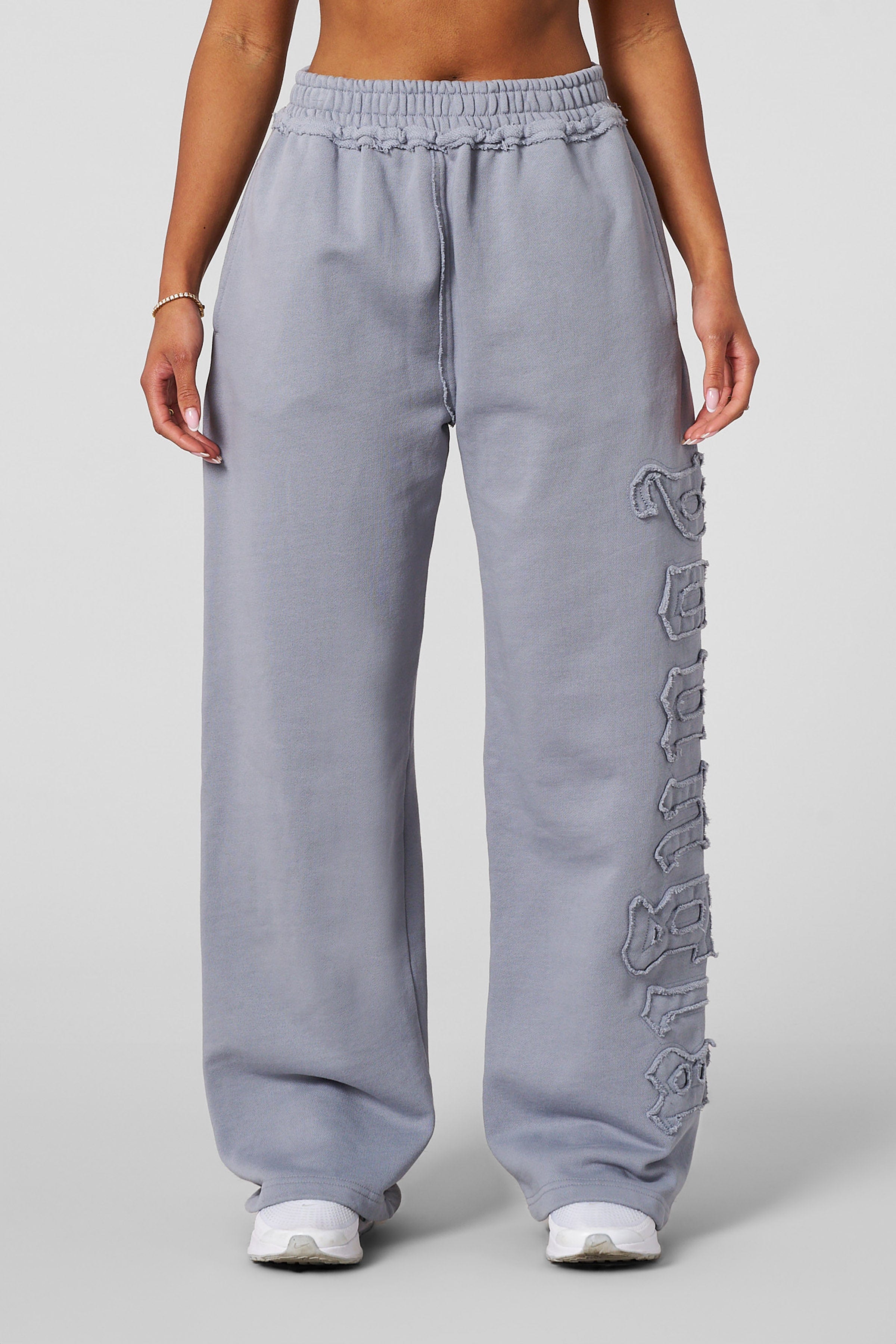 Side view showcasing the soft French terry fabric of the joggers.