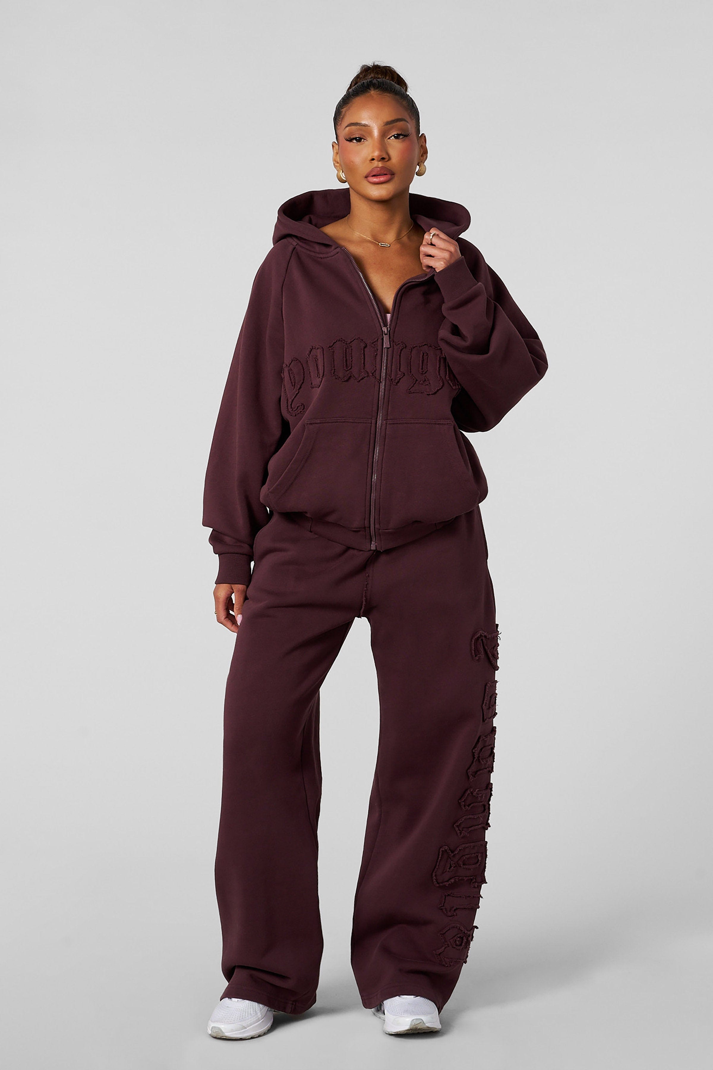 Front view of the cozy oversized zip-up hoodie, showcasing its stylish design.