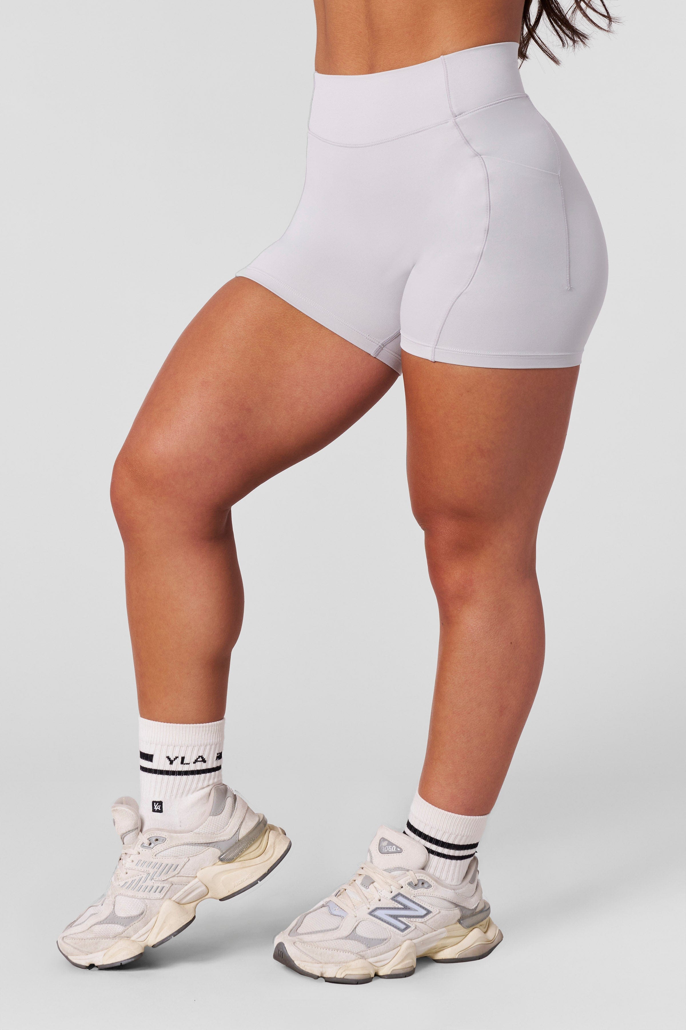 Athlete in high-impact activewear performing lunges in these shorts