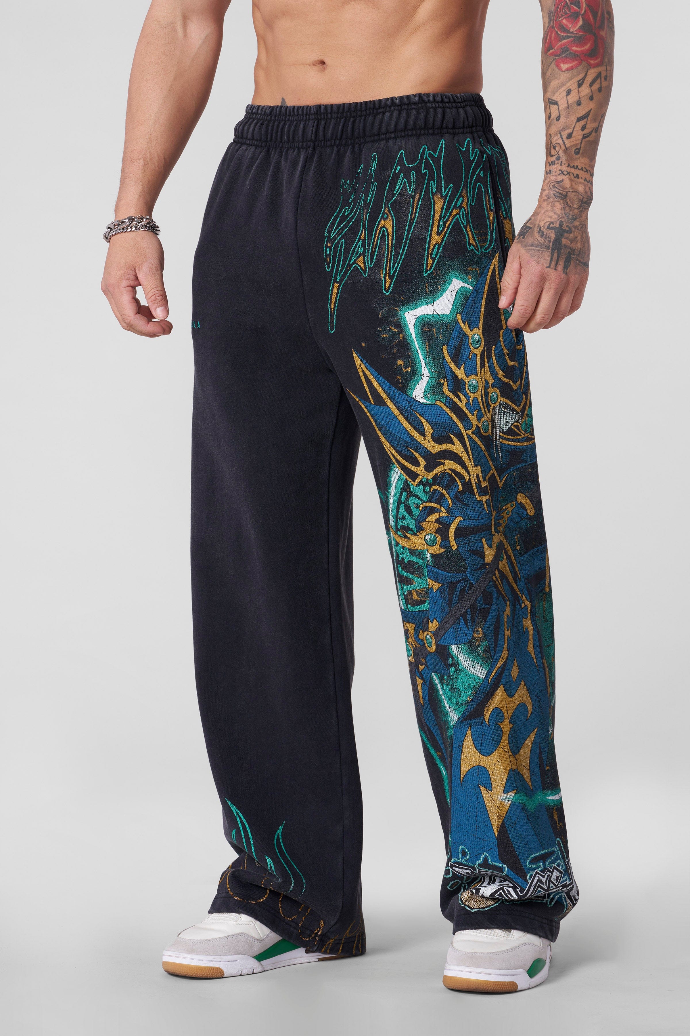 Side angle showcasing the oversized character graphic on the sweatpants