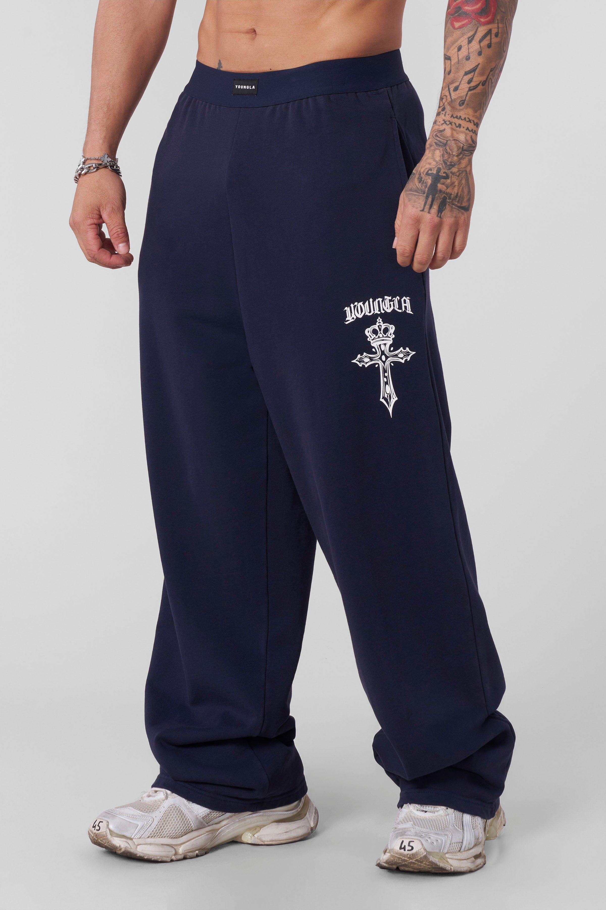 Model wearing Faith Sweats in a streetwear setting