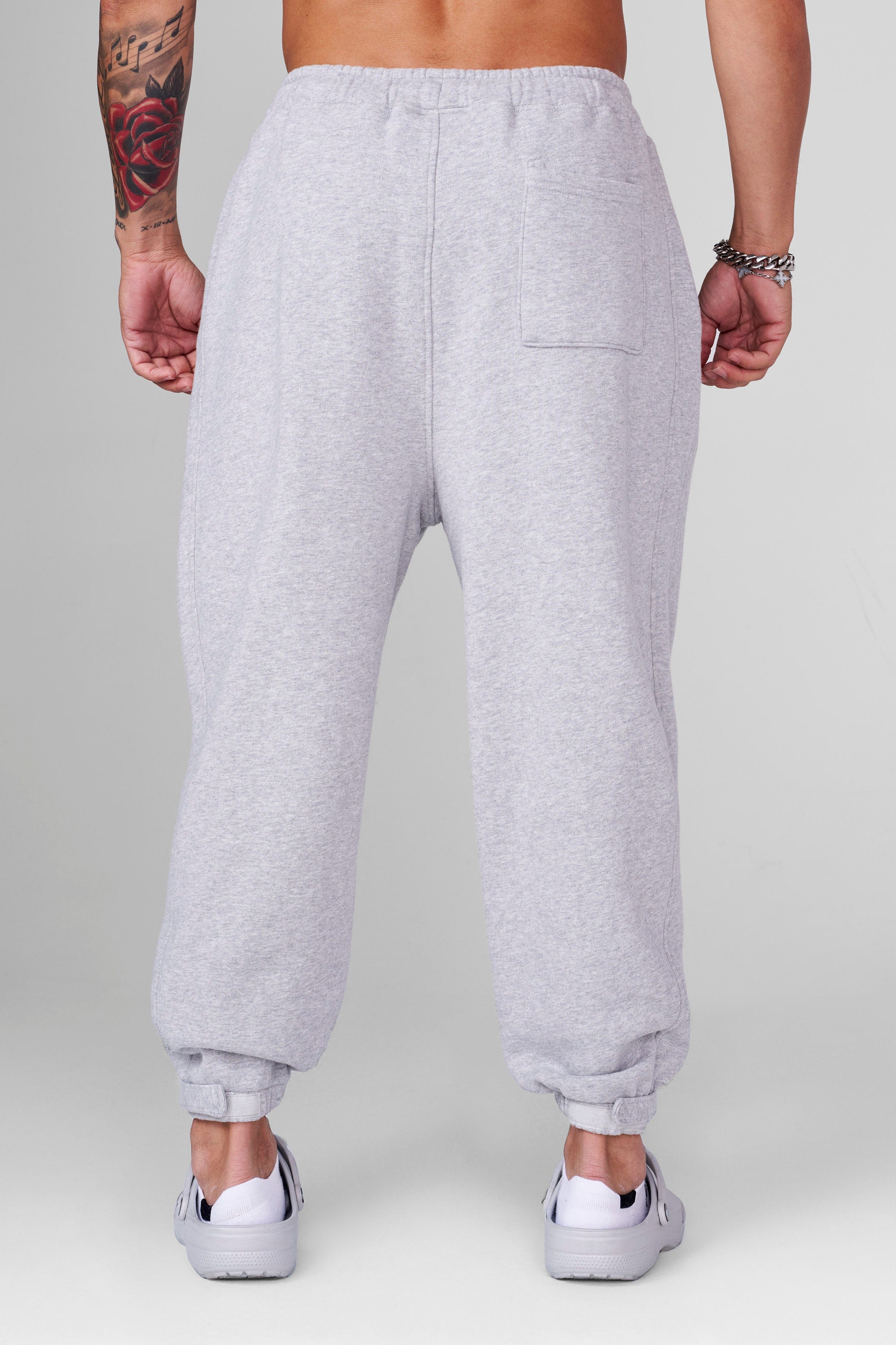 Side view of loose-fit anime joggers, ideal for gym activities.