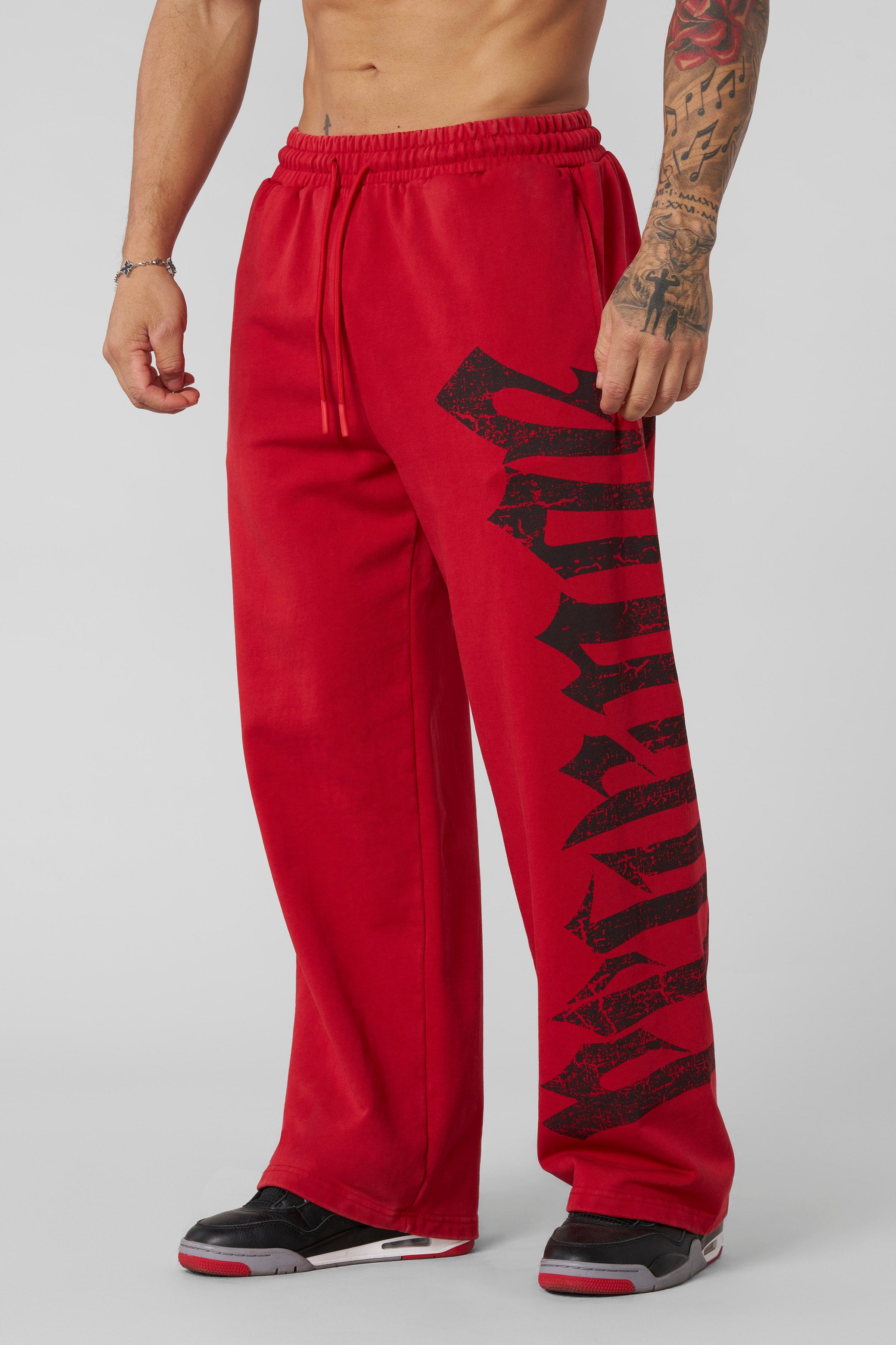 Close-up of rotated Revenge print detail on graphic joggers