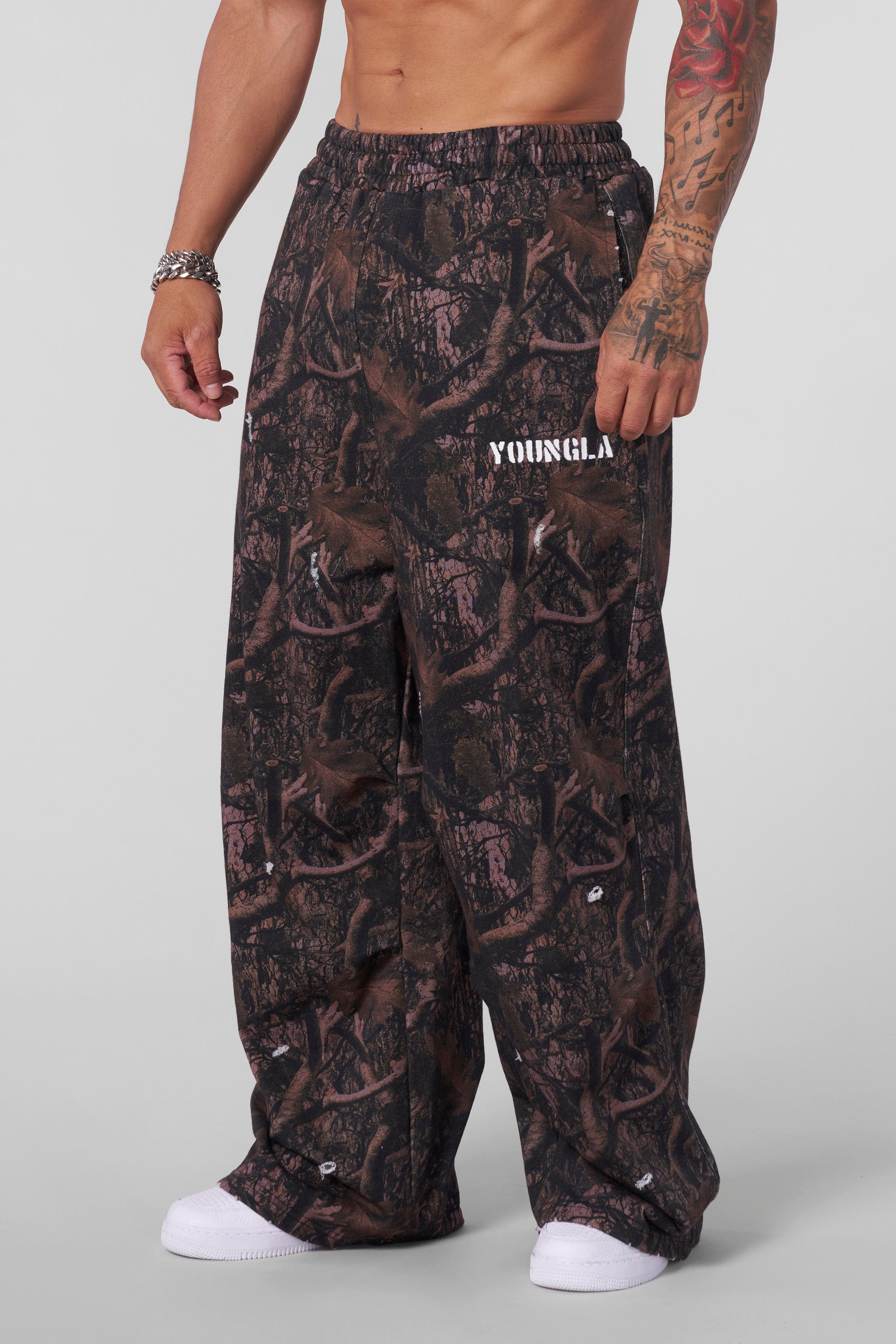 Close-up of the raw distress cuts on the Urban Edge sweatpants.