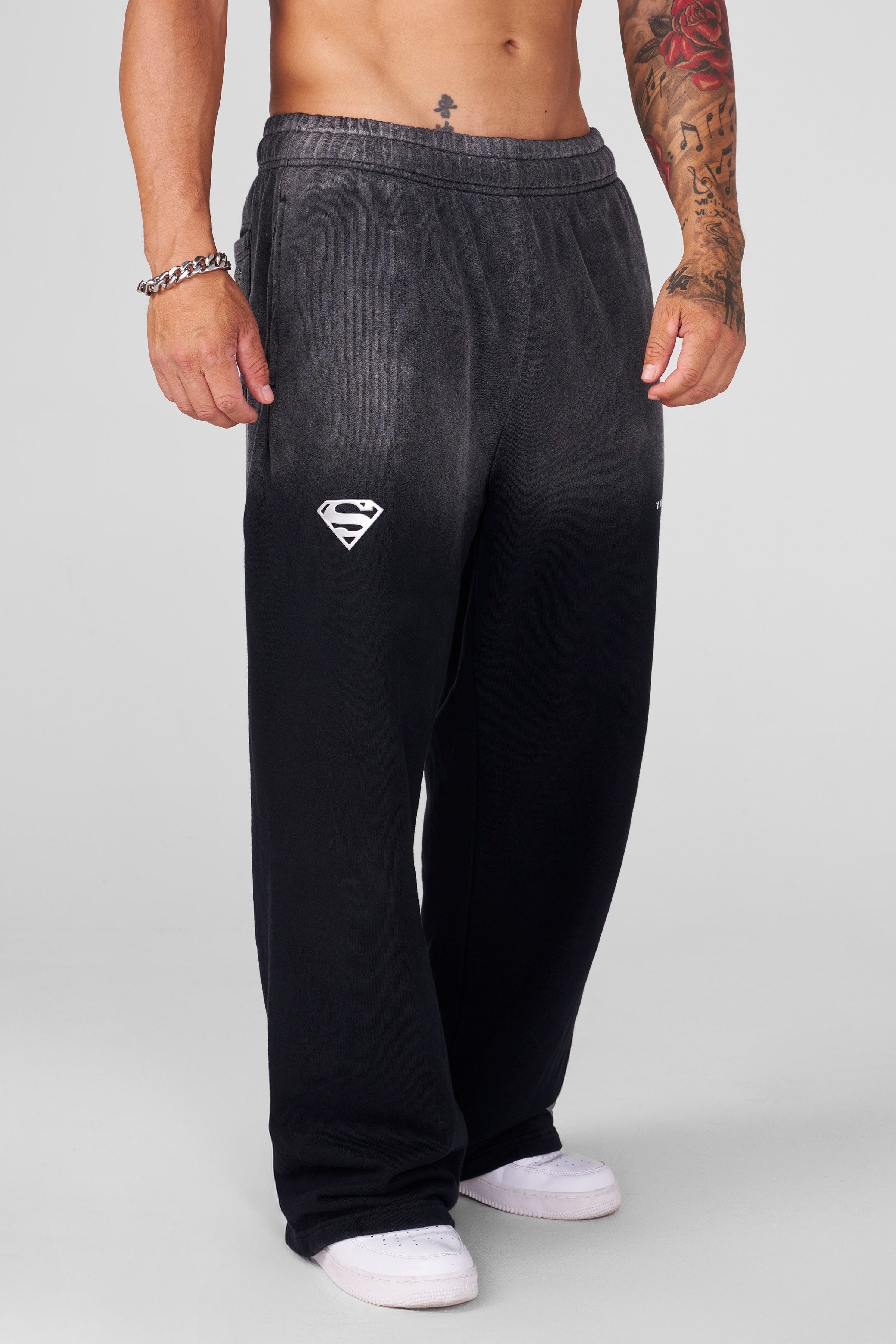 Close-up of YoungLA chrome logo on left leg