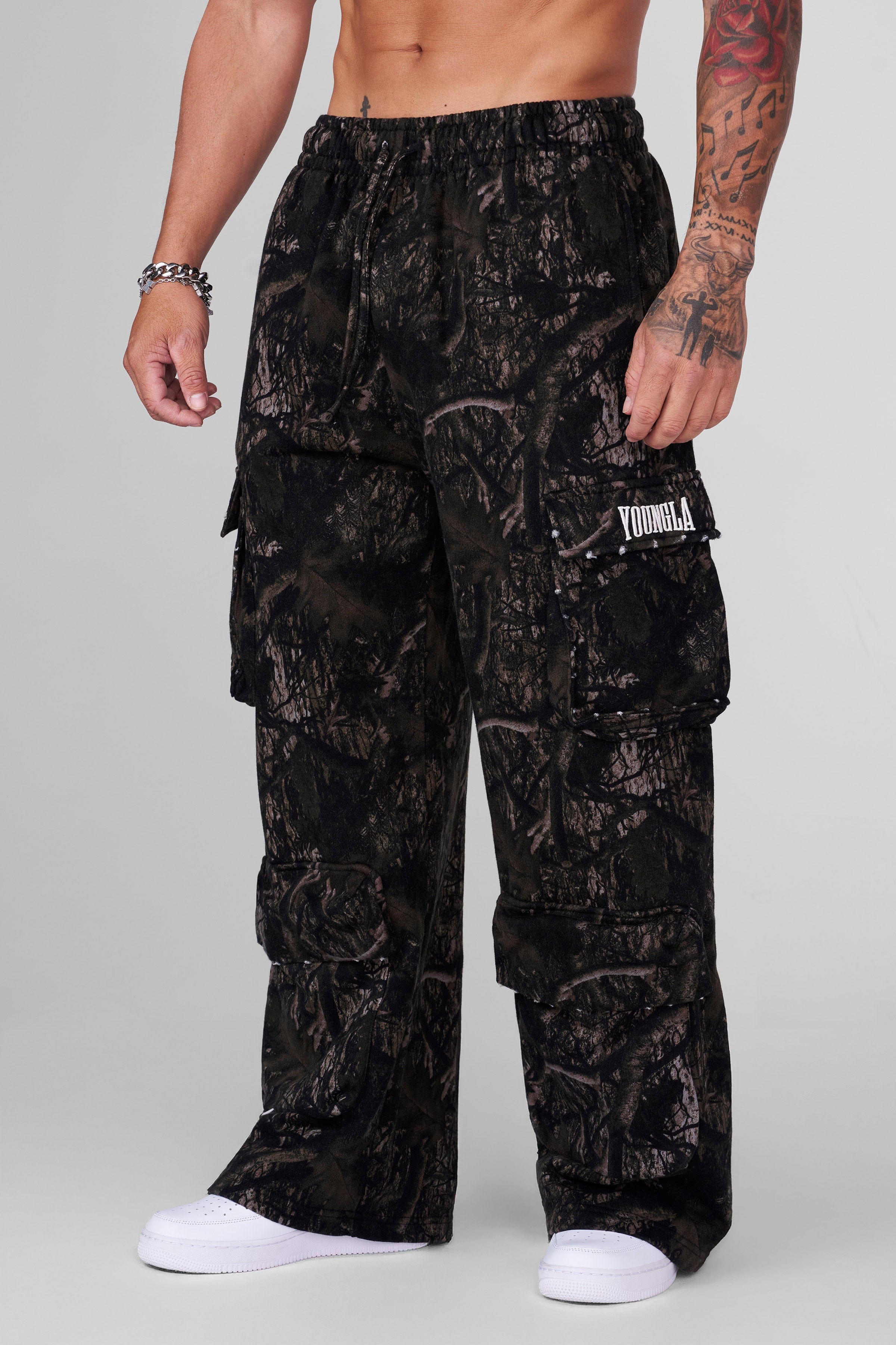 Front view of Heritage Cargo Sweatpants showcasing baggy fit and pockets.