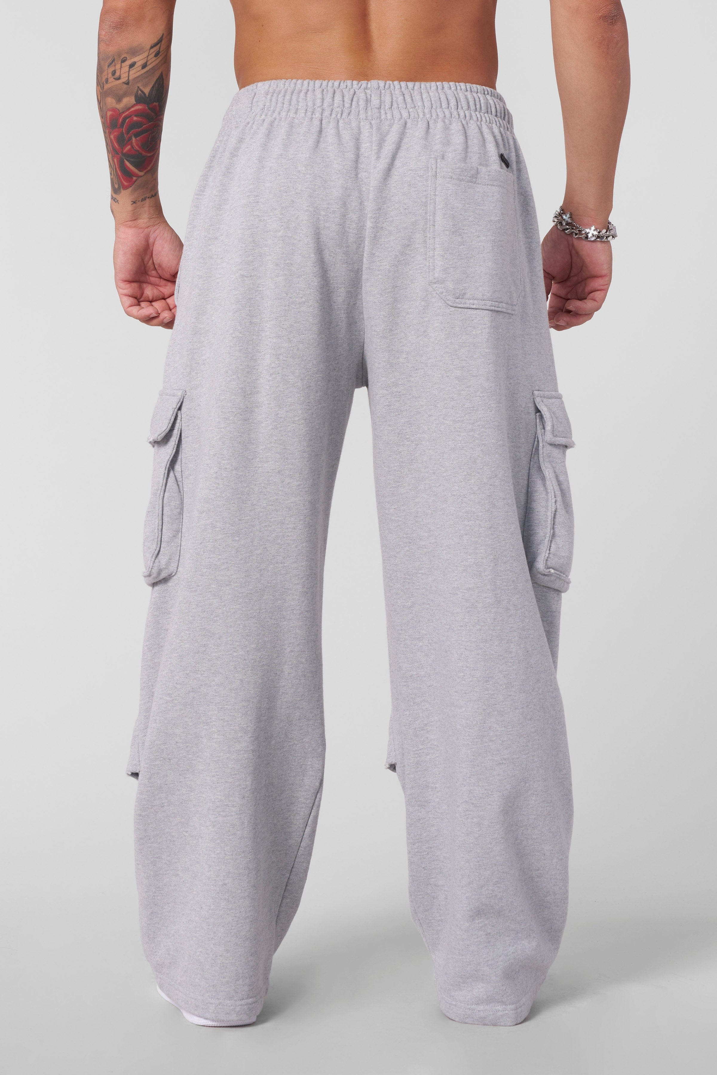 Front view of Heritage Cargo Sweatpants showcasing baggy fit and pockets.